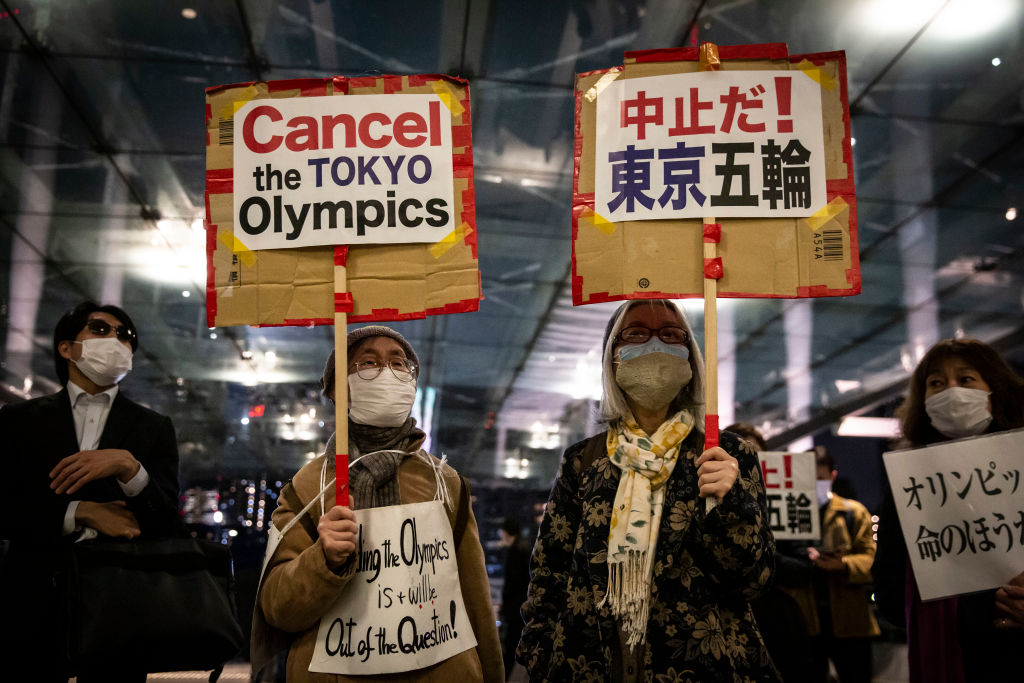 Demonstrators protest against the Tokyo Olympics outside the building of the Tokyo Organising Committee of the Olympic and Paralympic Games on March 25, 2021 in Tokyo, Japan. (Yuichi Yamazaki/Getty Images)