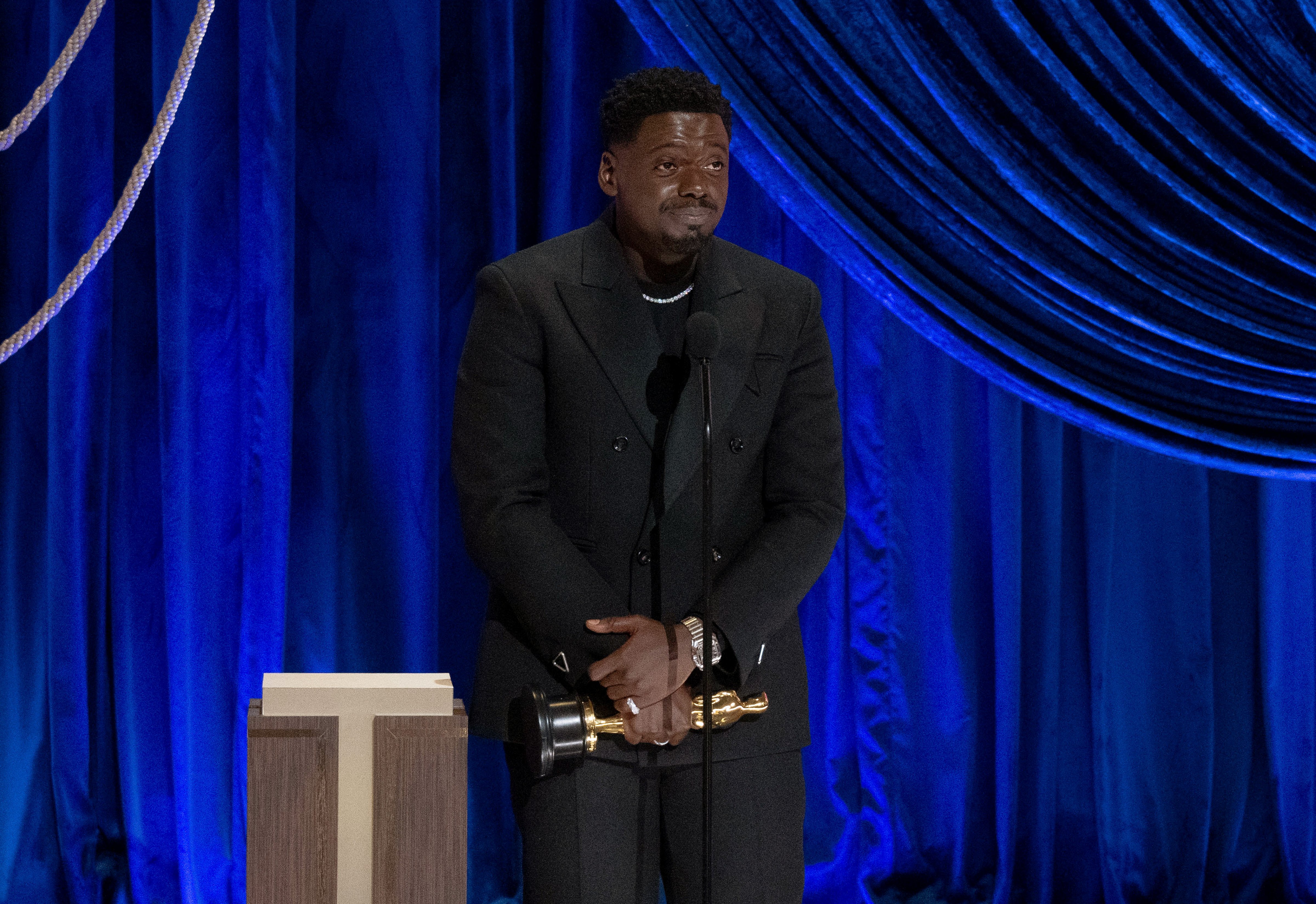 Daniel Kaluuya accepts the Oscar for Actor in a Supporting Role for 'Judas and the Black Messiah' during the 93rd Annual Academy Awards on April 25, 2021 (A.M.P.A.S. via Getty Images—2021 A.M.P.A.S.)