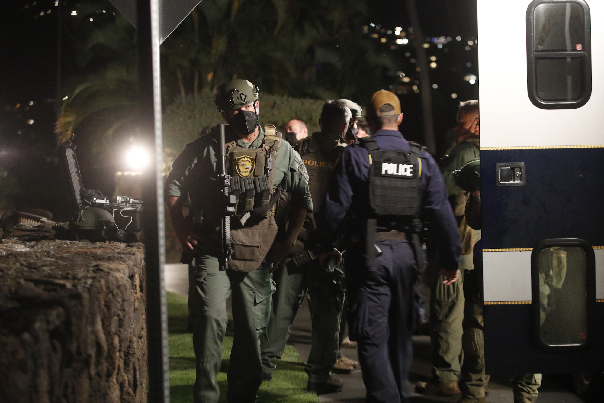 Members of the Honolulu Police Specialized Services Division respond to a barricade situation with an armed man at the Kahala Hotel in Honolulu on April 10, 2021. (Cindy Ellen Russell—Honolulu Star-Advertiser/AP)