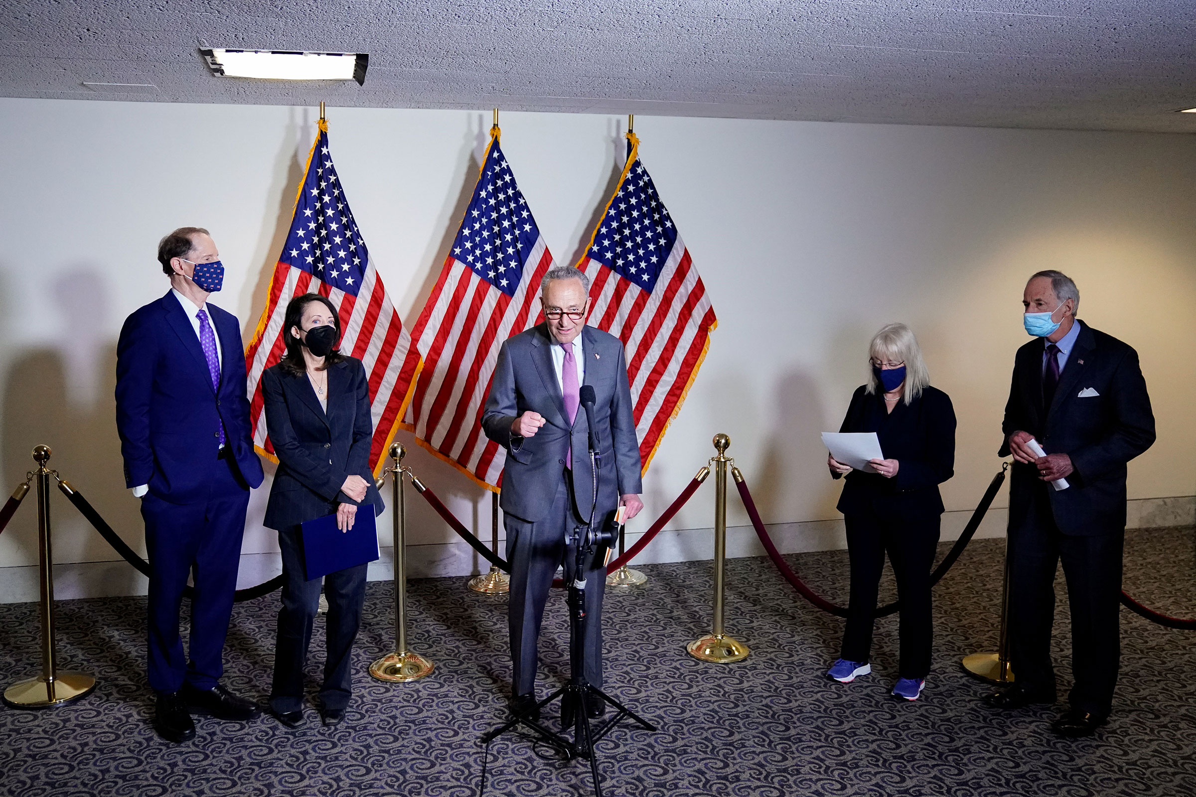Senate Majority Leader Chuck Schumer and Democratic leadership hold a news conference after the first Democratic luncheon meeting since COVID-19 restrictions went into effect on Capitol Hill in Washington, on April 13, 2021. (Erin Scott—Reuters)