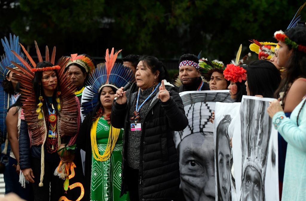 Indigenous rights defender, Brazilian lawyer Joenia Batista de Carvalho aka Joenia Wapichana takes part in a demonstration demanding climate justice outside the venue of the UN Climate Change Conference COP25 at the in Madrid, on December 9, 2019. (Cristina Quicler –AFP/Getty Images)