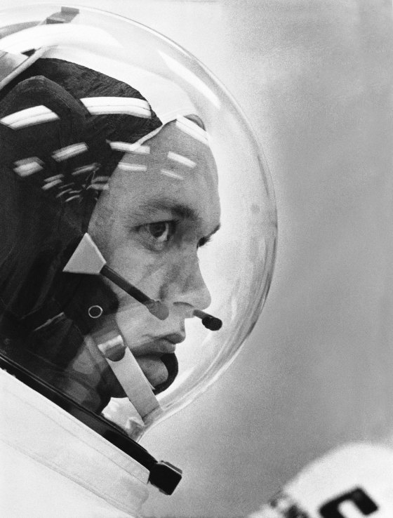 Astronaut Michael Collins wears his space helmet for the Apollo 11 moon mission, on July 20, 1969.