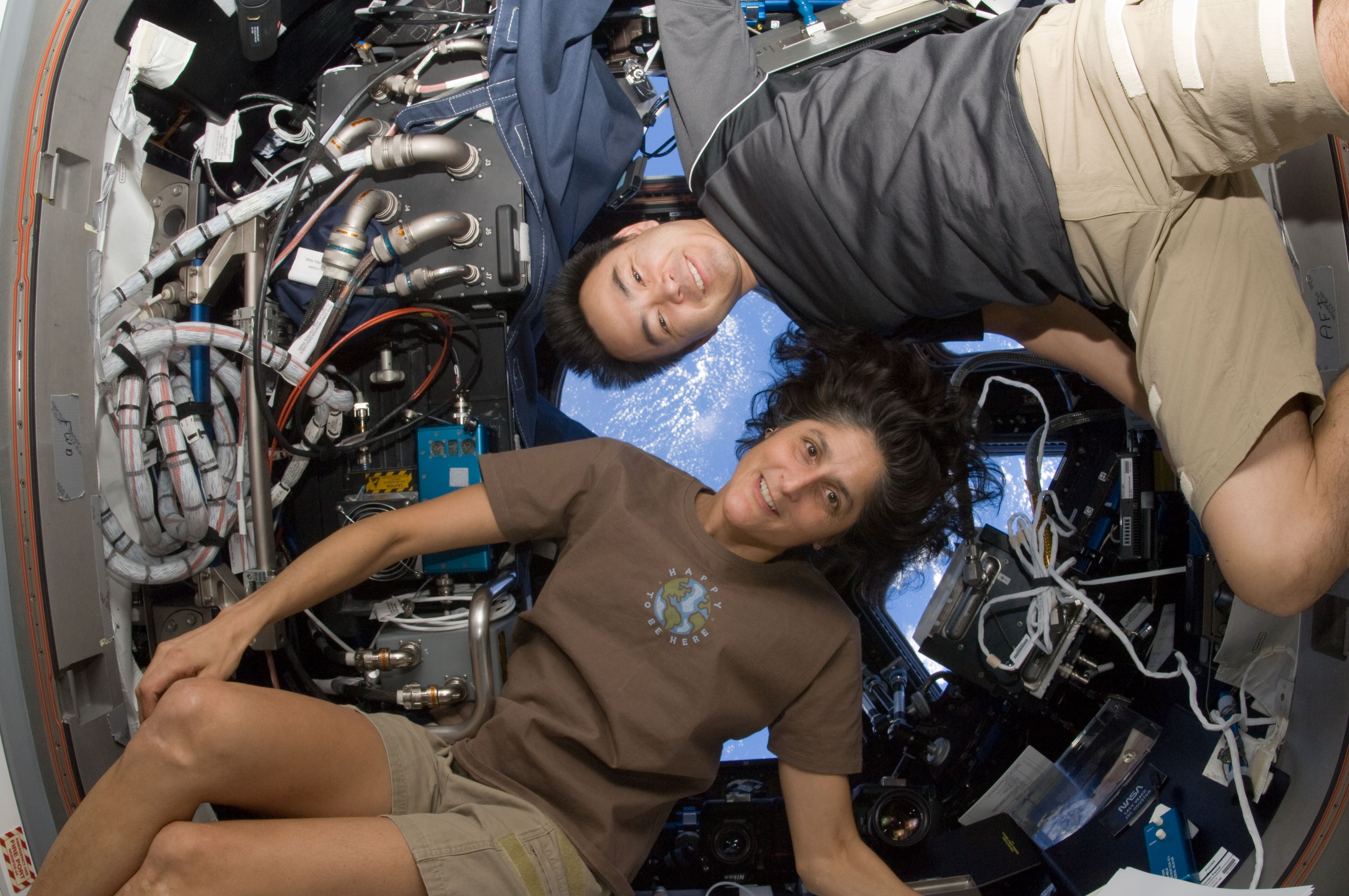 NASA astronaut Sunita Williams, Expedition 33 commander; and Japan Aerospace Exploration Agency astronaut Aki Hoshide, flight engineer, pose for a photo in the Cupola of the International Space Station. (NASA)