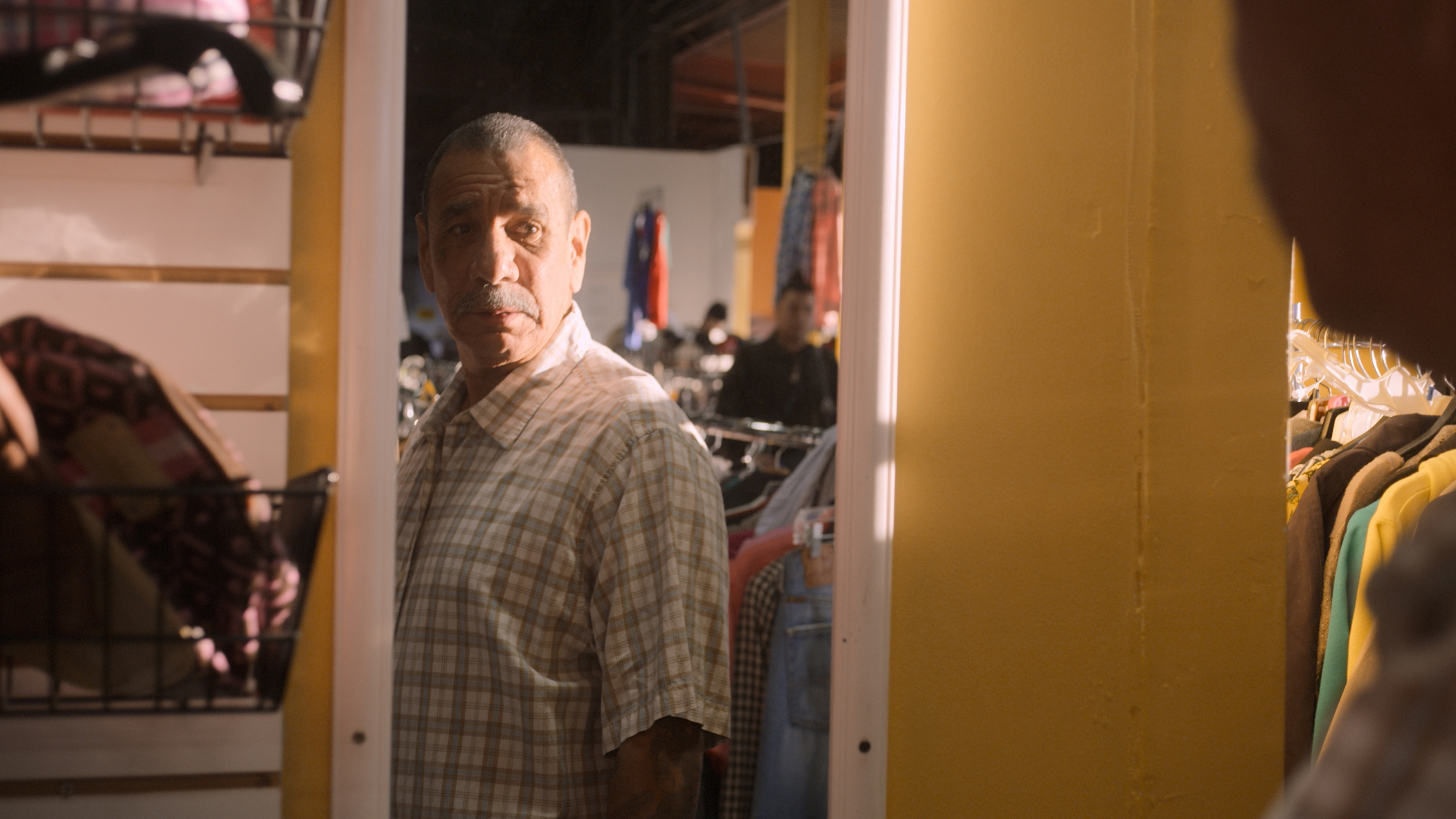 Rudy, who goes shopping after being released from 40 years in prison, in Worn Stories. (COURTESY OF NETFLIX—© 2021 Netflix, Inc.)