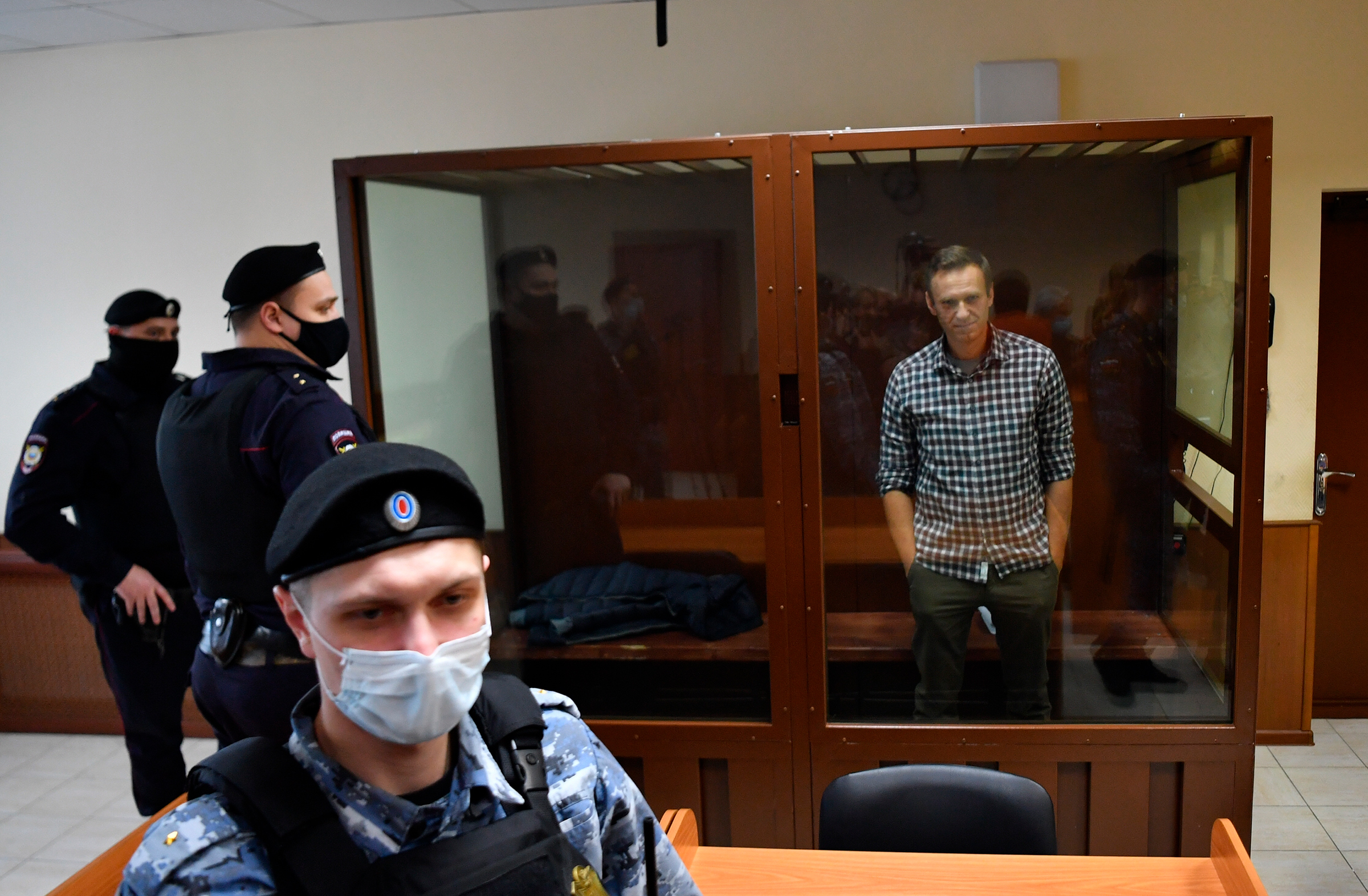 Navalny waits in a courtroom during a hearing on appellation to cancel the decision to replace his suspended sentence in the Yves Rocher fraud case with a jail term at Babushkinsky Court, Moscow, on Feb. 20.