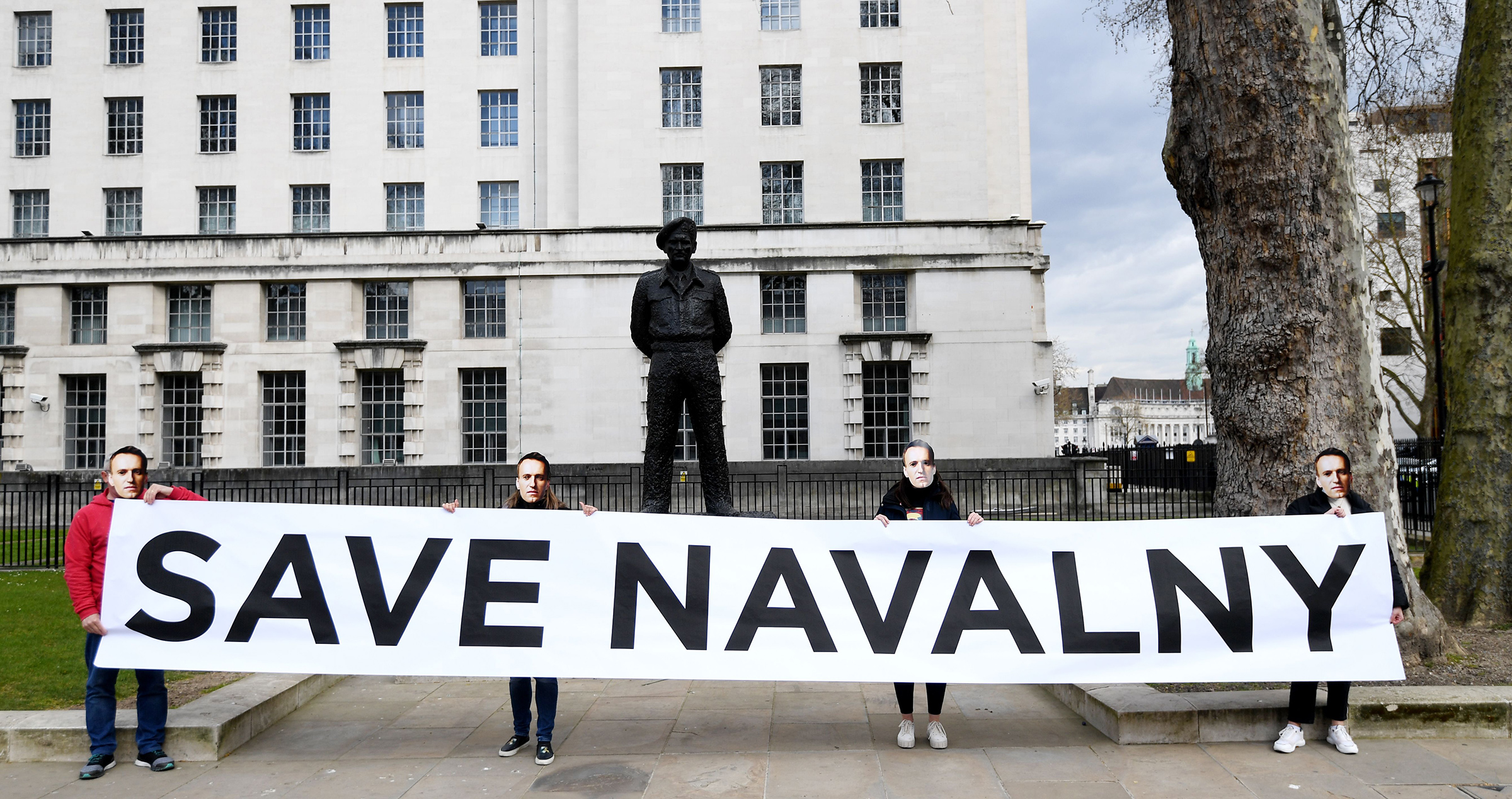 Supporters of Navalny stage a demonstration organized by the group "Art of Rebel" outside Downing Street in London on April 13, 2021. (Facundo Arrizabalaga—EPA-EFE/Shutterstock)