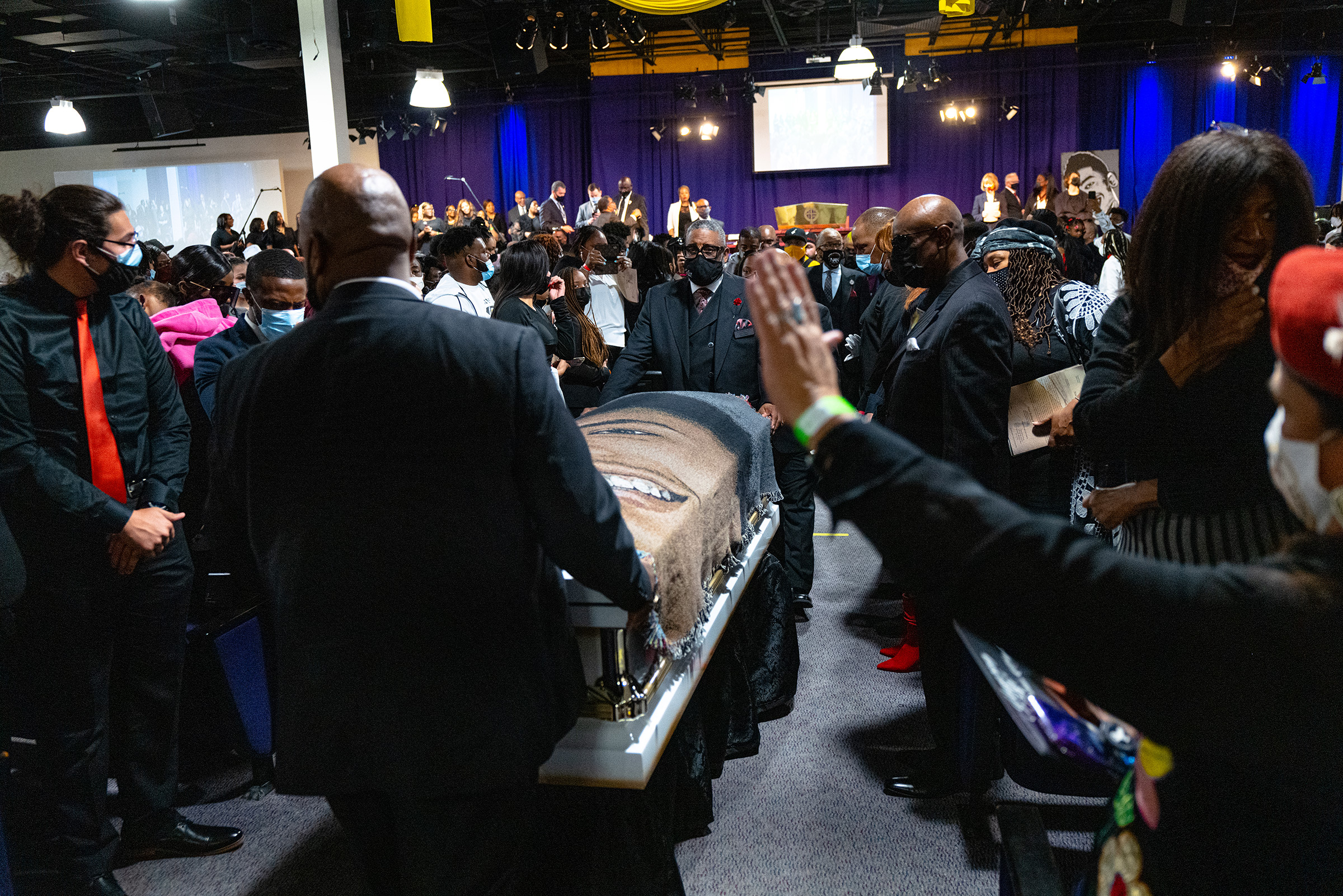 The casket of Daunte Wright was taken from the church after his funeral as his family walked behind it at Shiloh Temple International Ministries in Minneapolis on April 22.