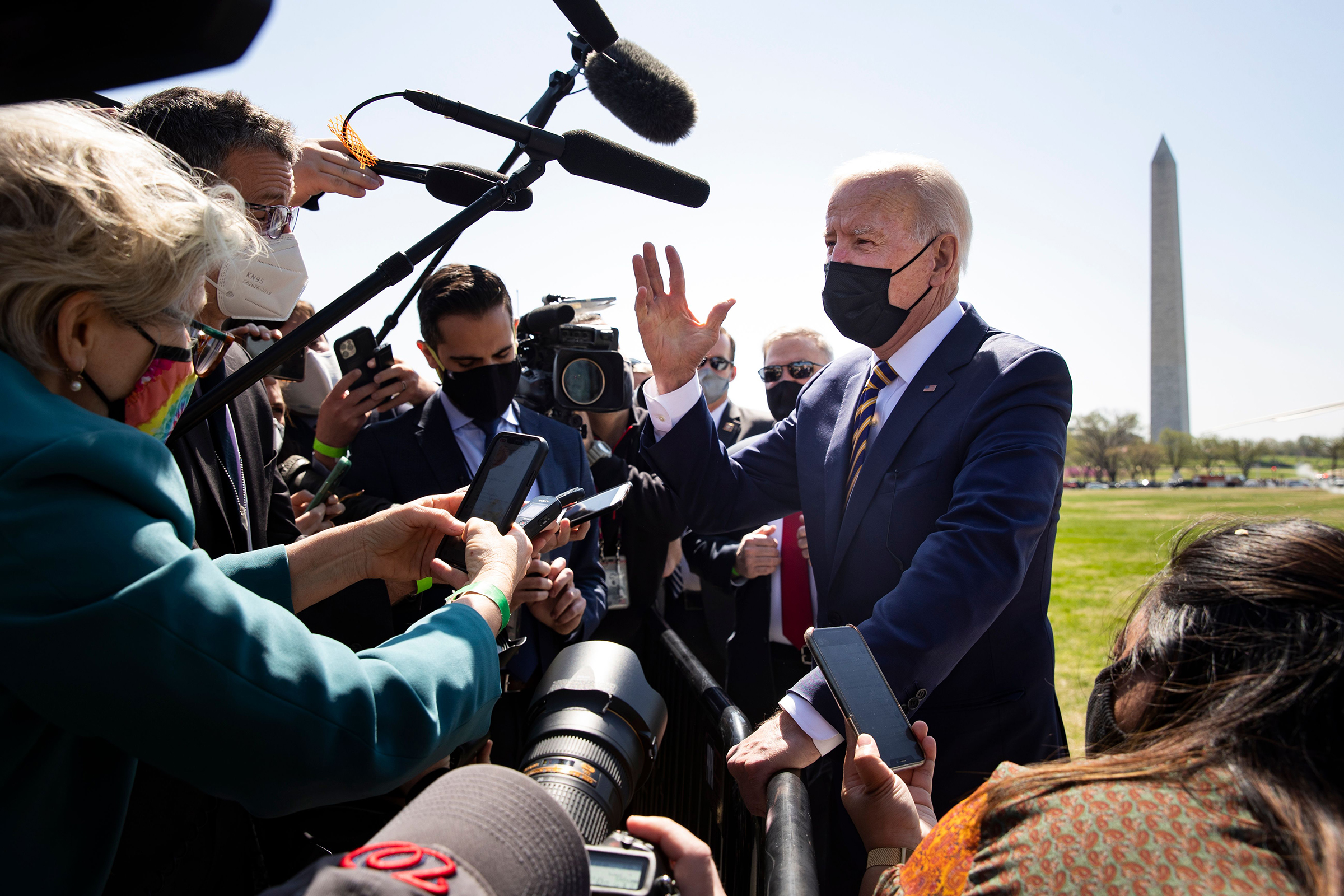 President Biden delivers brief remarks on infrastructure to journalists after arriving on the Ellipse by Marine One en route to the White House on April 5. (Michael Reynolds—POOL/EPA-EFE/Shutterstock)