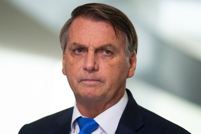 Jair Bolsonaro, Brazil's president, pauses while speaking during a news conference at the Planalto Palace in Brasilia, Brazil, on Wednesday, March 31, 2021. Commanders of Brazil's army, navy and air force were fired on Tuesday after Bolsonaro dismissed his defense chief as part of a broader cabinet restructuring.
