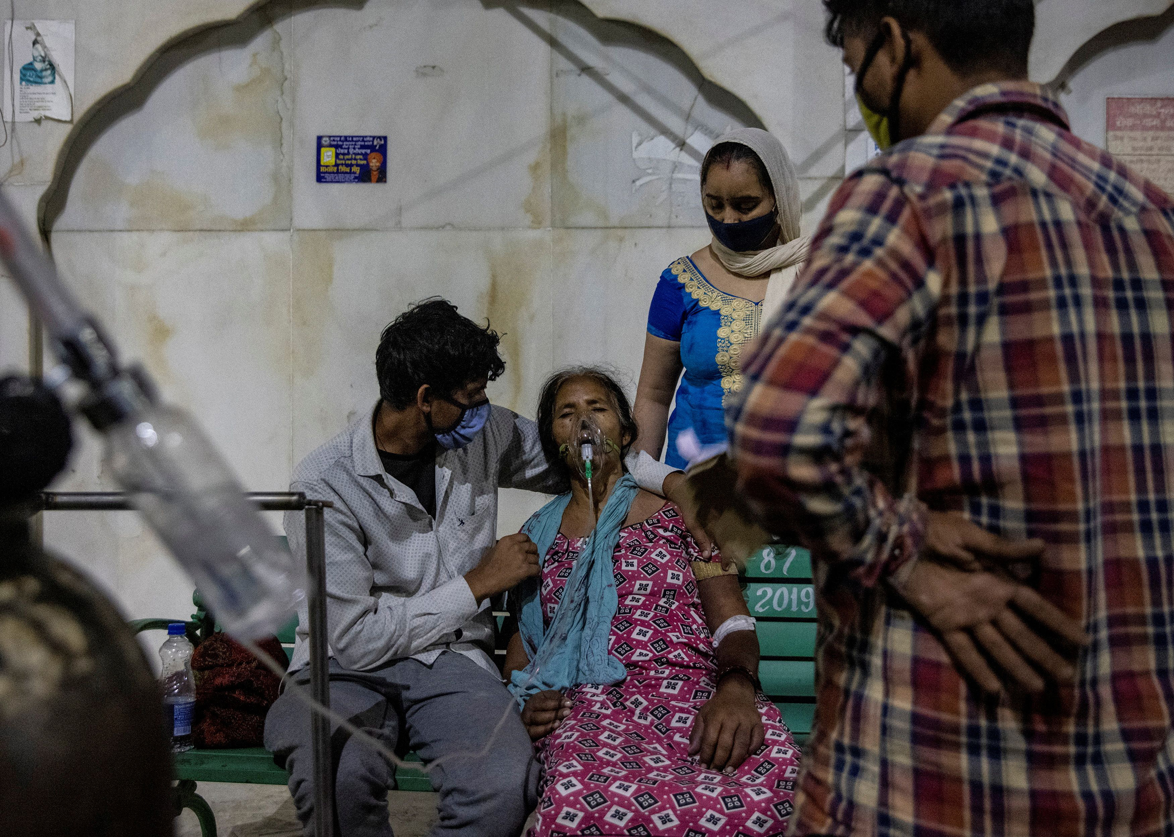 A woman receives free oxygen support at a Sikh temple in Ghaziabad, India, on April 24, 2021. (Danish Siddiqui—Reuters)