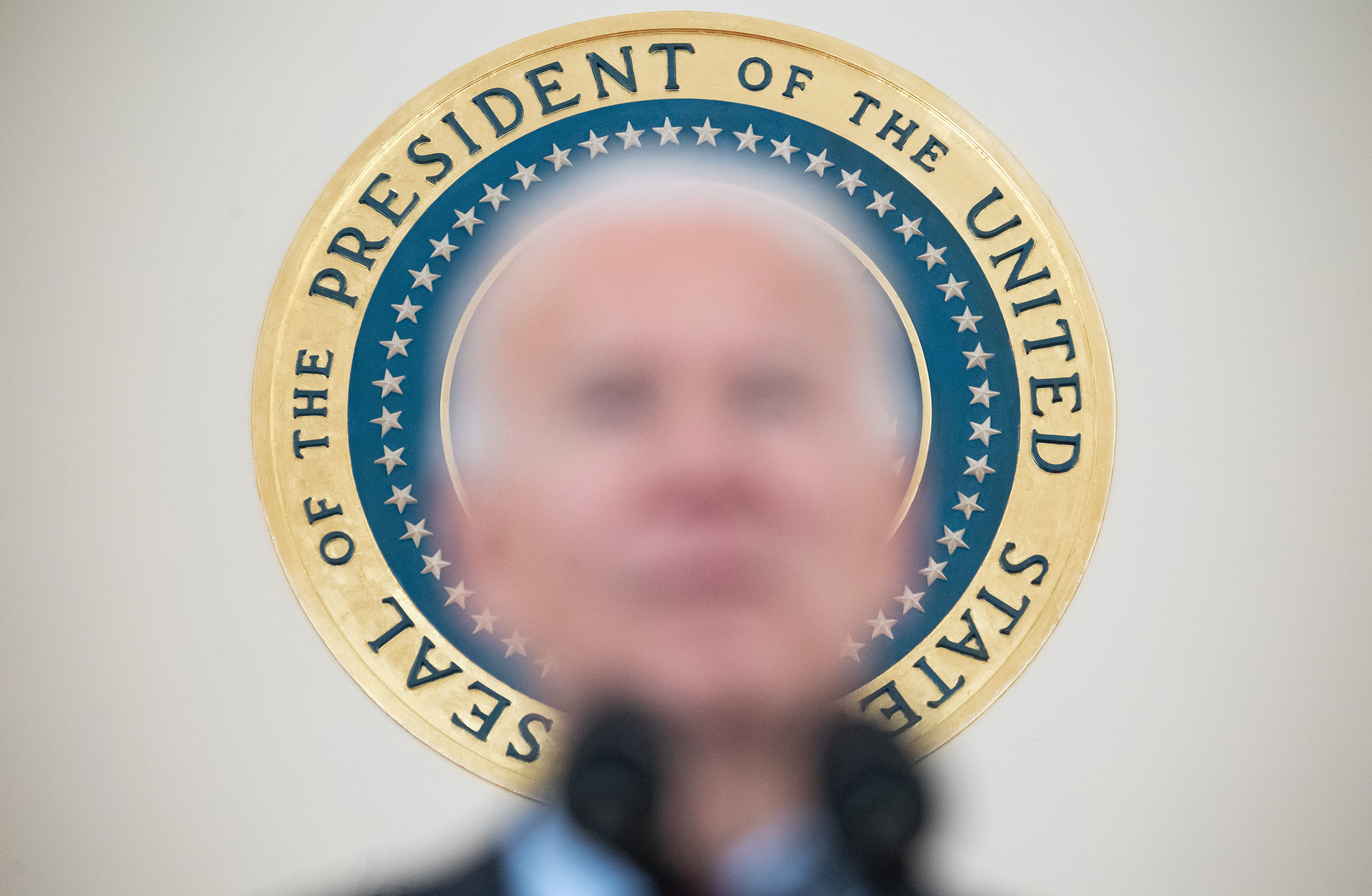 The seal of the President of the United States is seen as President Joe Biden speaks about lives lost to COVID-19 after the death toll passed 500,000, at the White House on Feb. 22, 2021.