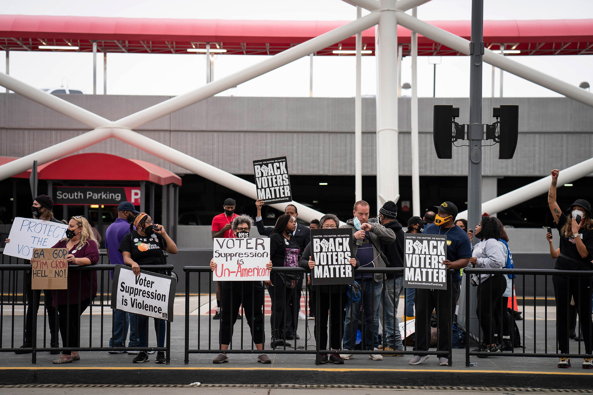 Voting-rights activists call for a boycott of Delta Air Lines during a protest at Hartsfield-Jackson Atlanta International Airport in Atlanta, March 25, 2021. (Nicole Craine—The New York Times/Redux)