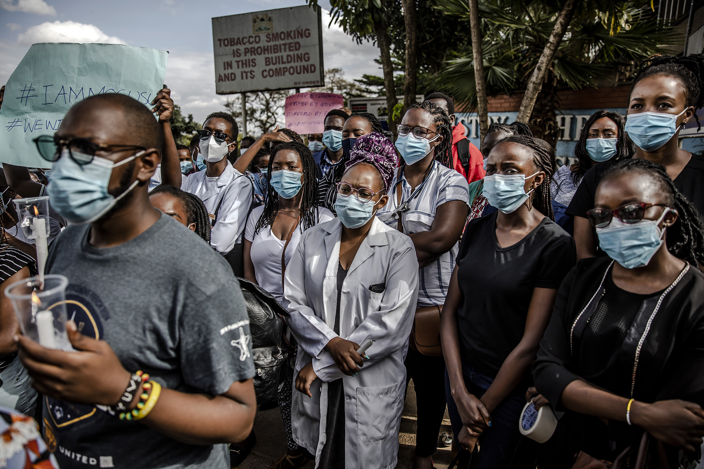 Demonstrators gather during a protest by health care workers, including nurses and clinical officers, against poor working conditions outside the Ministry of Health in Nairobi on Dec. 9, 2020.