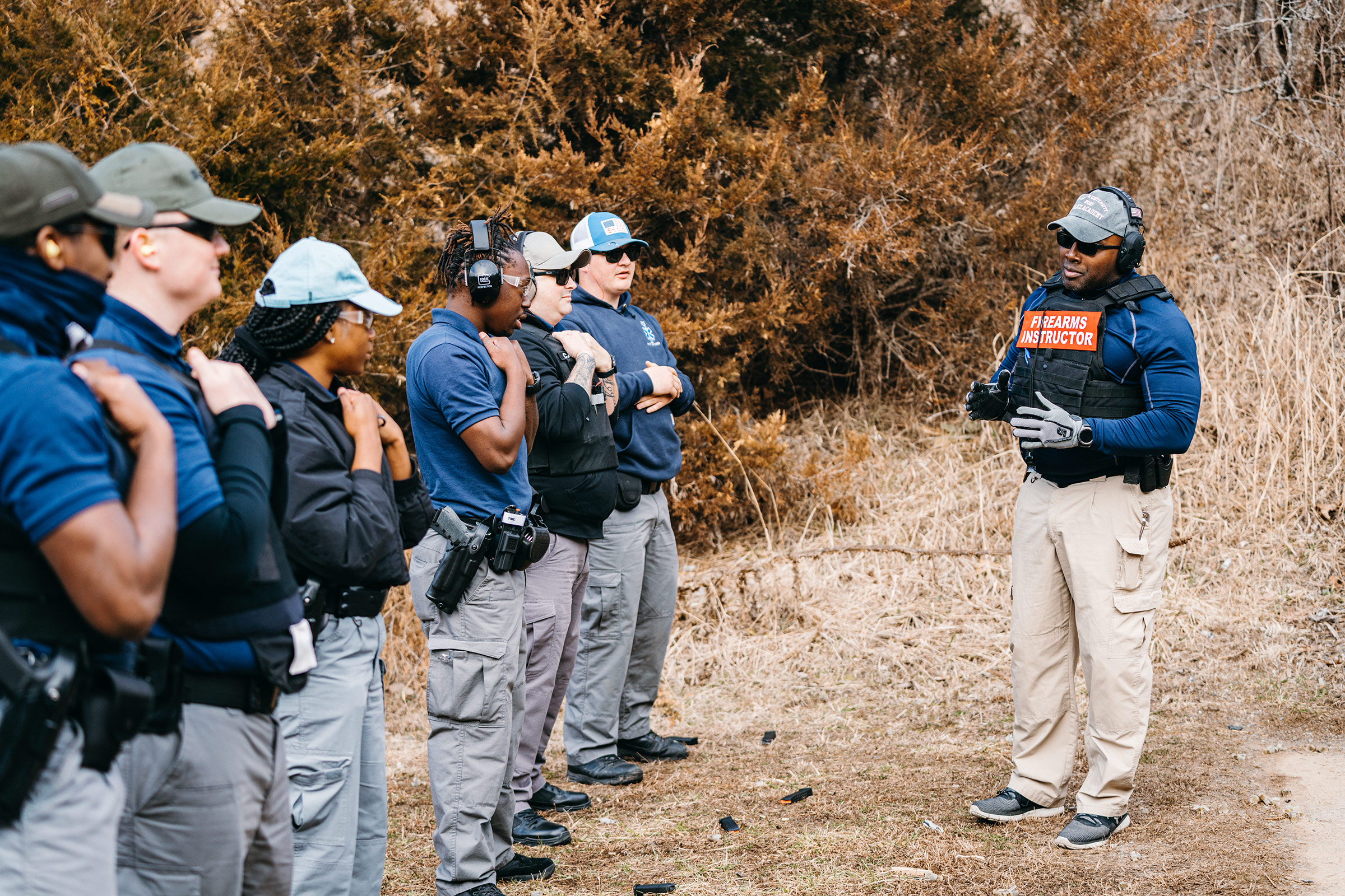 Lincoln University police chief Gary Hill prepares recruits for firearms training at a shooting range in Missouri on March 6 (Joe Martinez for TIME)