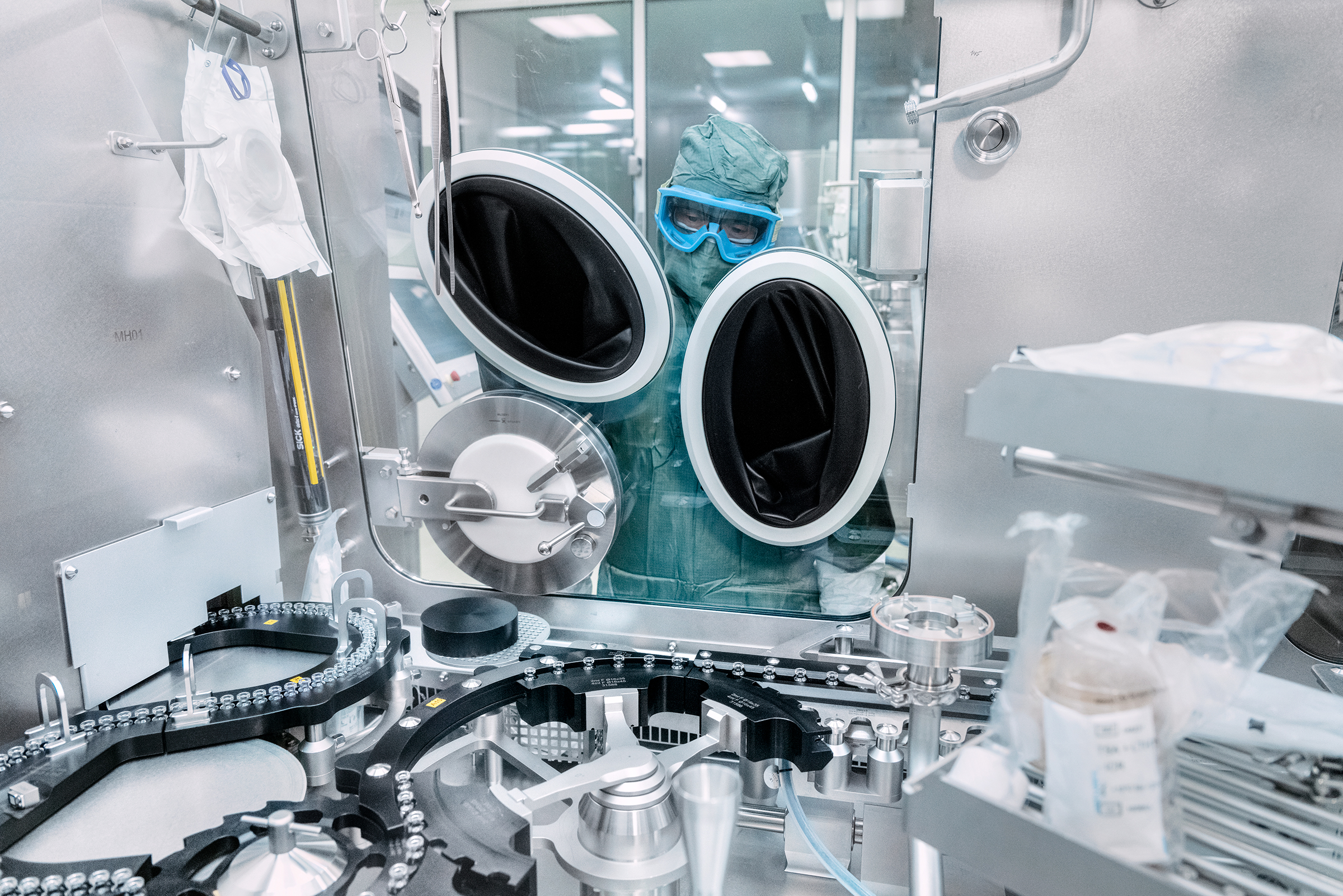 At the fill-and-finish facility operated by Baxter in Halle, 120 miles north of Marburg, technicians monitor the washing and sterilization of the vials before they are filled with vaccine, then stoppered and sealed.