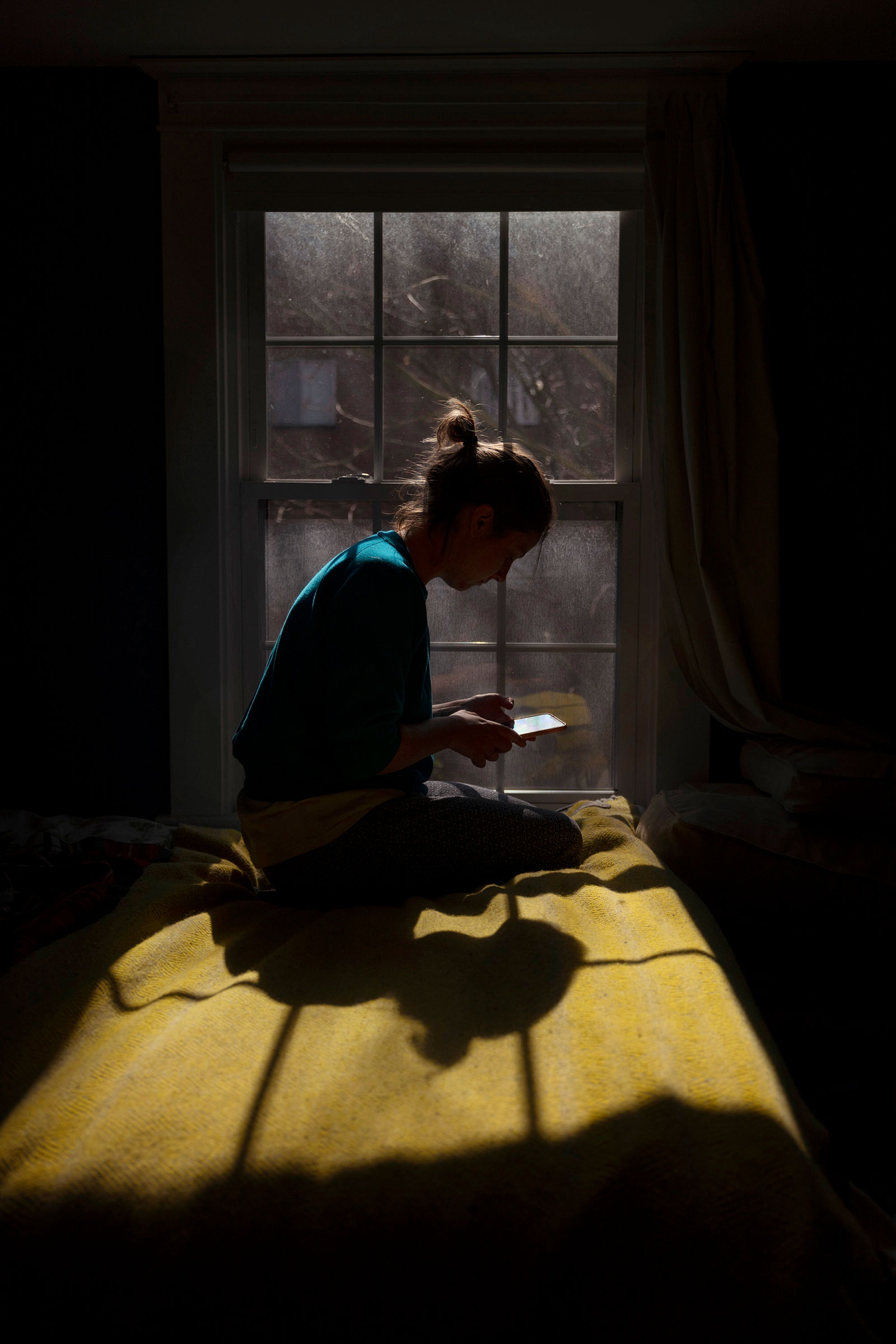 When the pandemic hit, photographer Eva O’Leary found herself living on her own in her central Pennsylvania hometown. She navigated her isolation through a series of self-portraits. (Eva O'Leary)