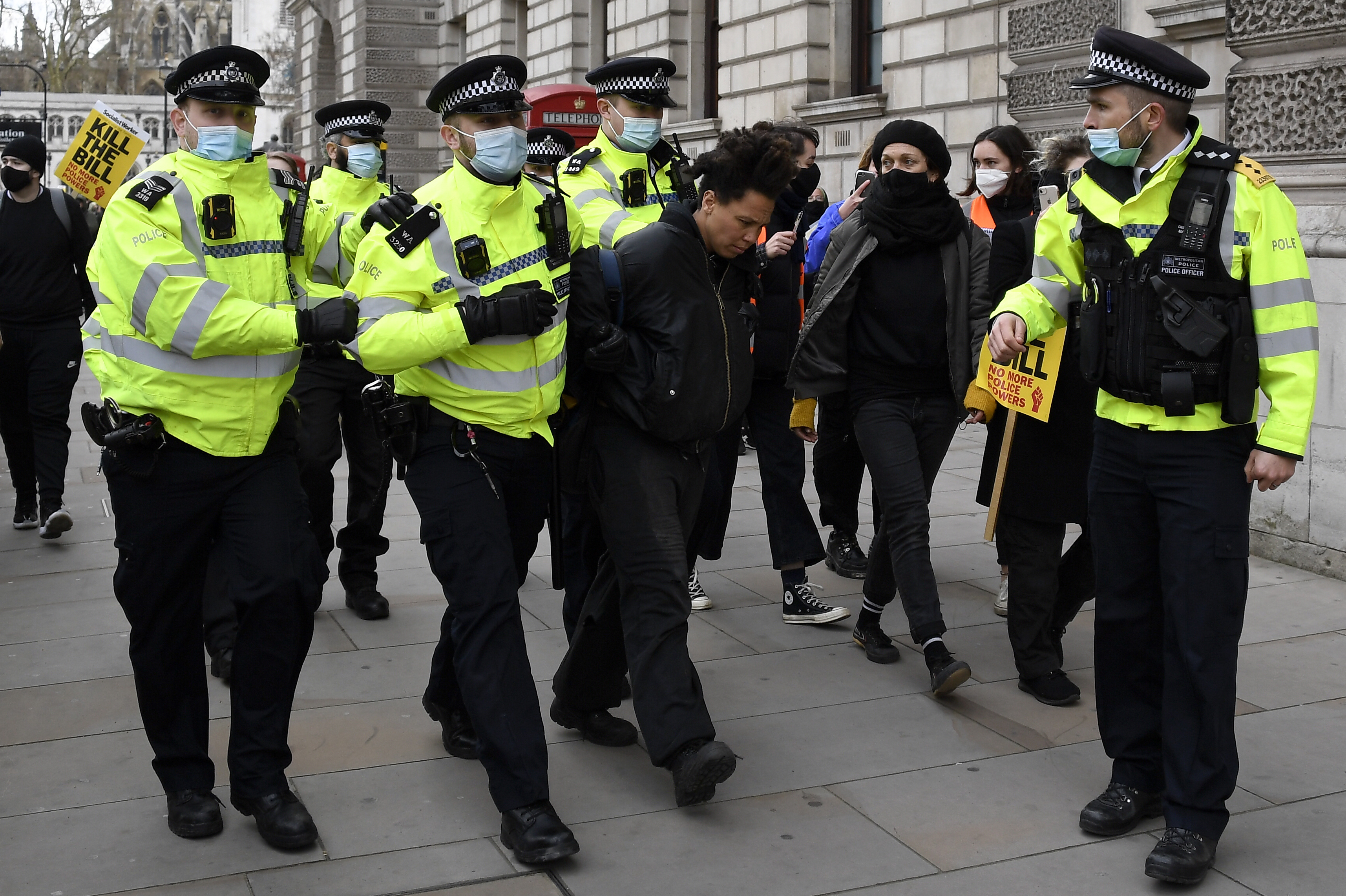 Police detain a man for blocking traffic at Parliament Square during a 'Kill the Bill' protest in London, U.K. on April 3, 2021. (Alberto Pezzali—AP)