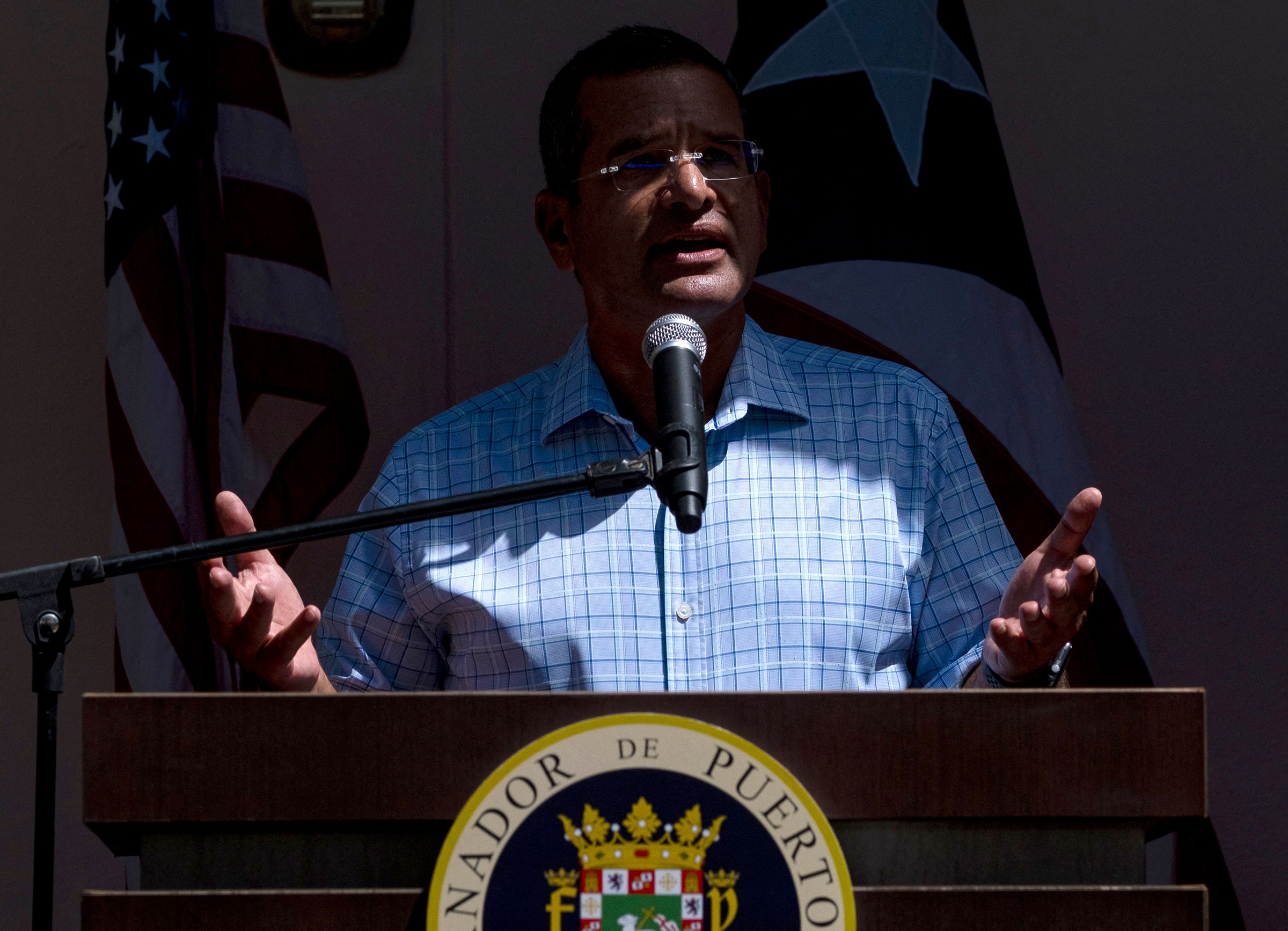 Puerto Rico's Governor Pedro Pierluisi speaks at a press conference at a Puerto Rico National Guard vaccination center on March 10.