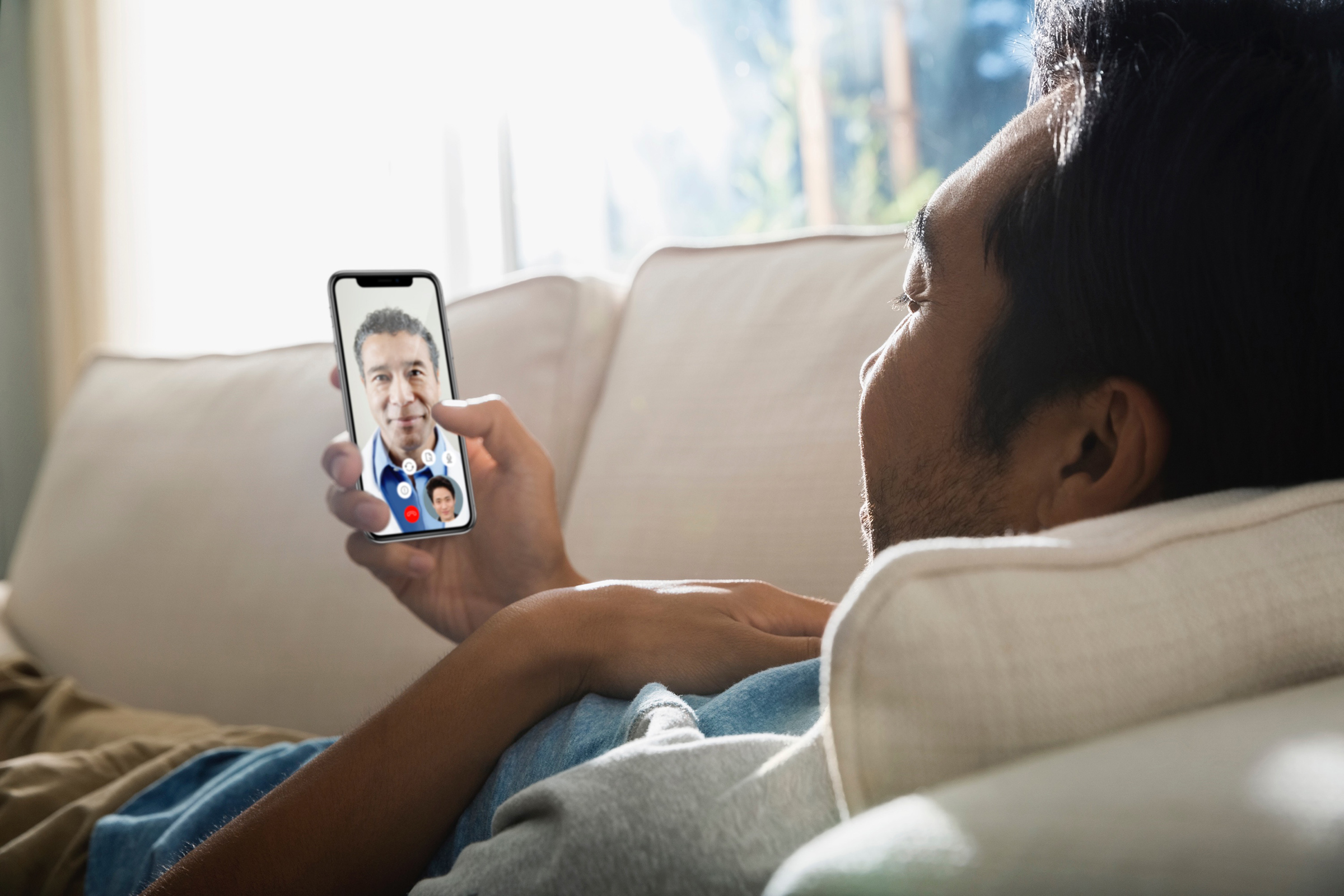 A patient visits with a doctor through the Teladoc app. (Courtesy Teladoc Health)