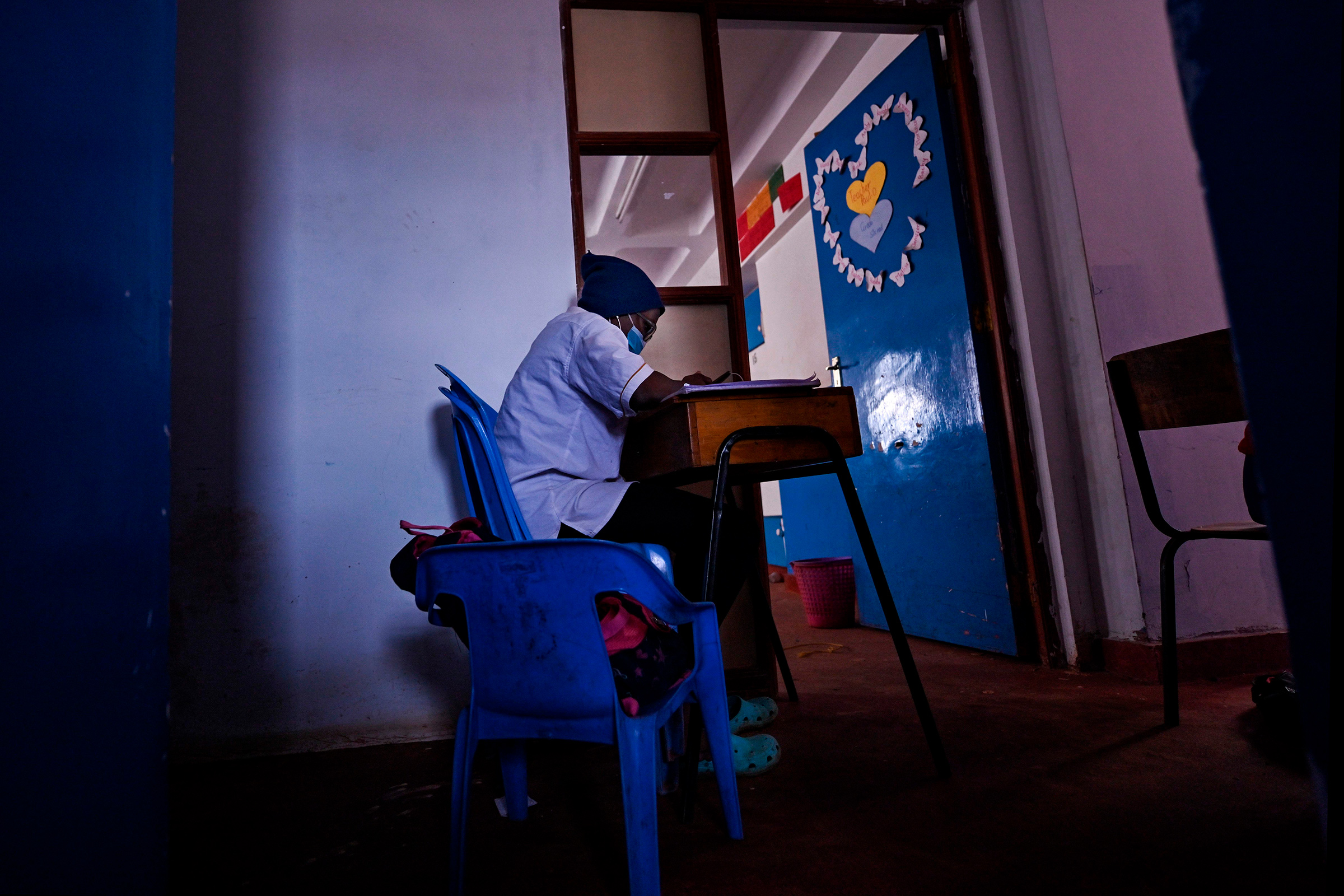 A student sits at her desk at Kibera School for Girls in Kibera, Nairobi, kenya, on Aug. 7, 2020. (Tony Karumba—AFP/Getty Images)