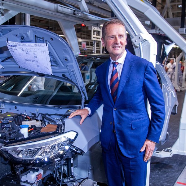 Herbert Diess, Volkswagen Group CEO, stands beside the assembly line for the production of the ID.3 electric car.