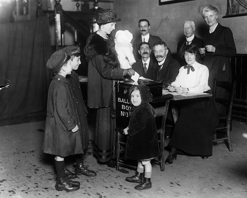 A woman votes in 1918 (Corbis via Getty Images)