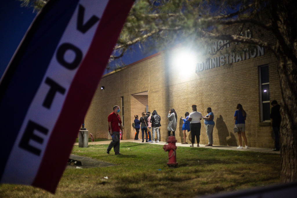 With an hour left to vote, people wait in line at Manor ISD Administration building in Manor, Texas, on November 3, 2020 (Montinique Monroe—Getty Images)
