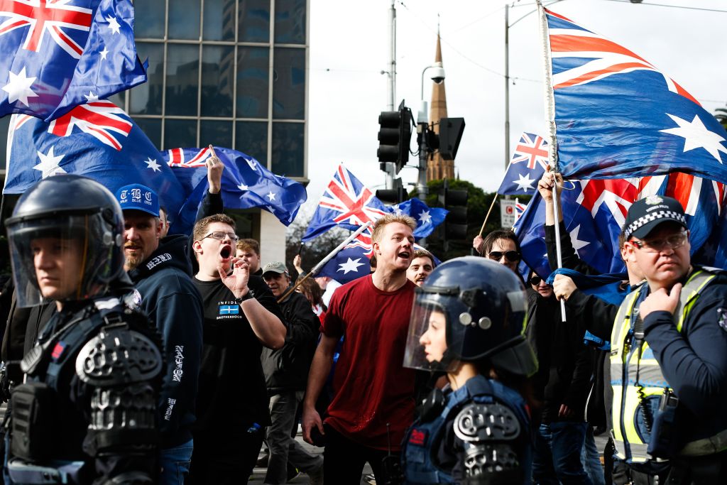 Police patrol as members of the right wing nationalists 'True Blue Crew' march during a protest organized by the anti-Islam True Blue Crew supported by the United Patriots Front, in Melbourne, Australia on June 25, 2017. (Asanka Brendon Ratnayake/Anadolu Agency/Getty Images)