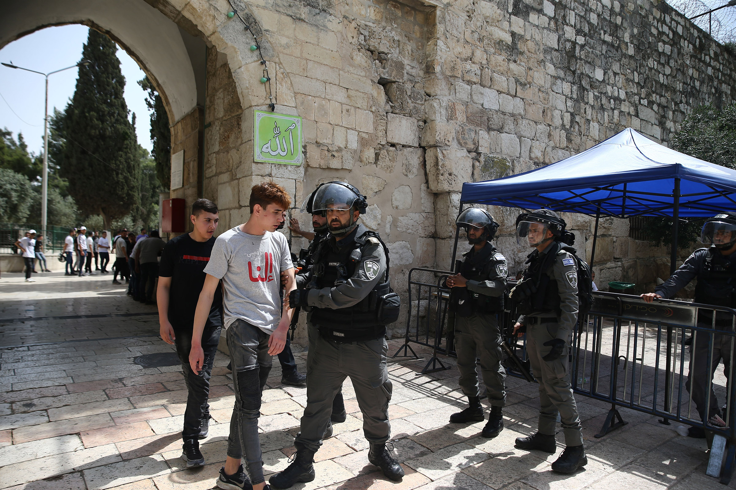 Israeli police detain some Palestinians during their intervention at the Al-Aqsa Mosque in East Jerusalem on May 21, 2021.