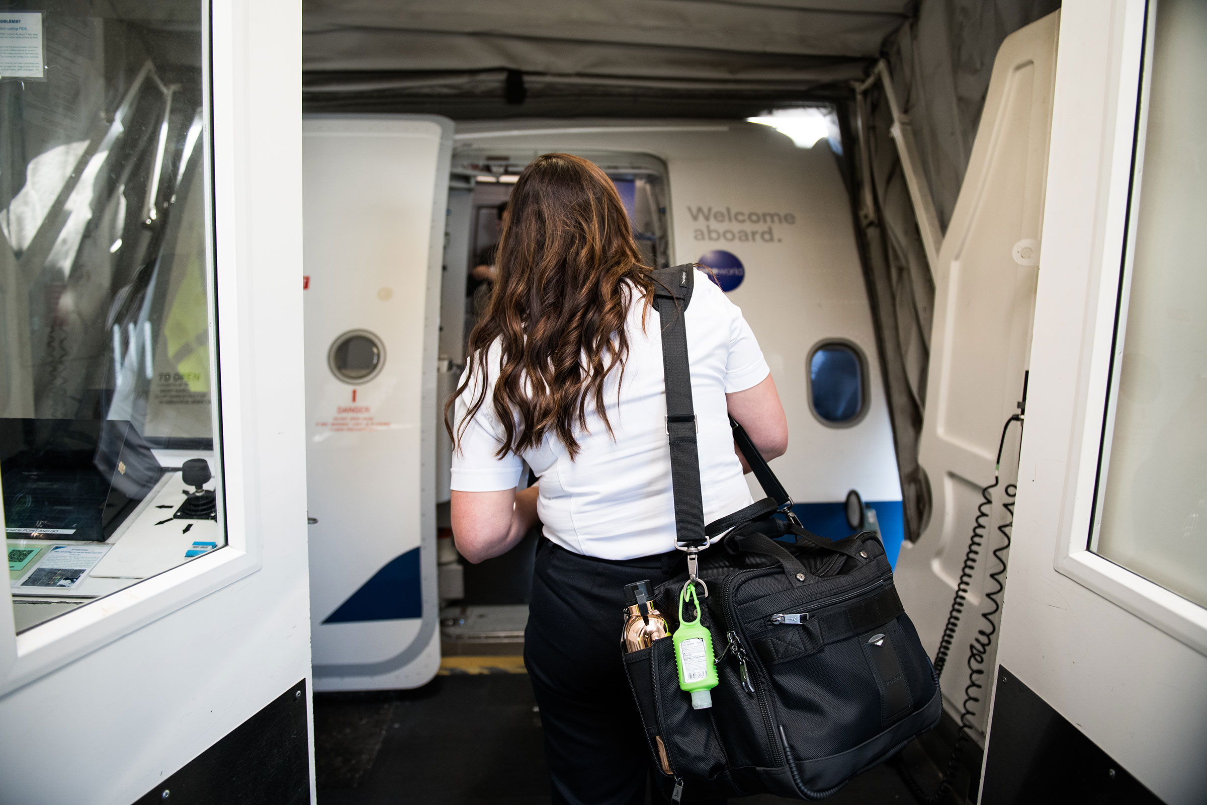 Alaska Airlines Captain Kat Pullis boards Flight 1258, heading from Seattle to San Francisco. (Chona Kasinger for TIME)