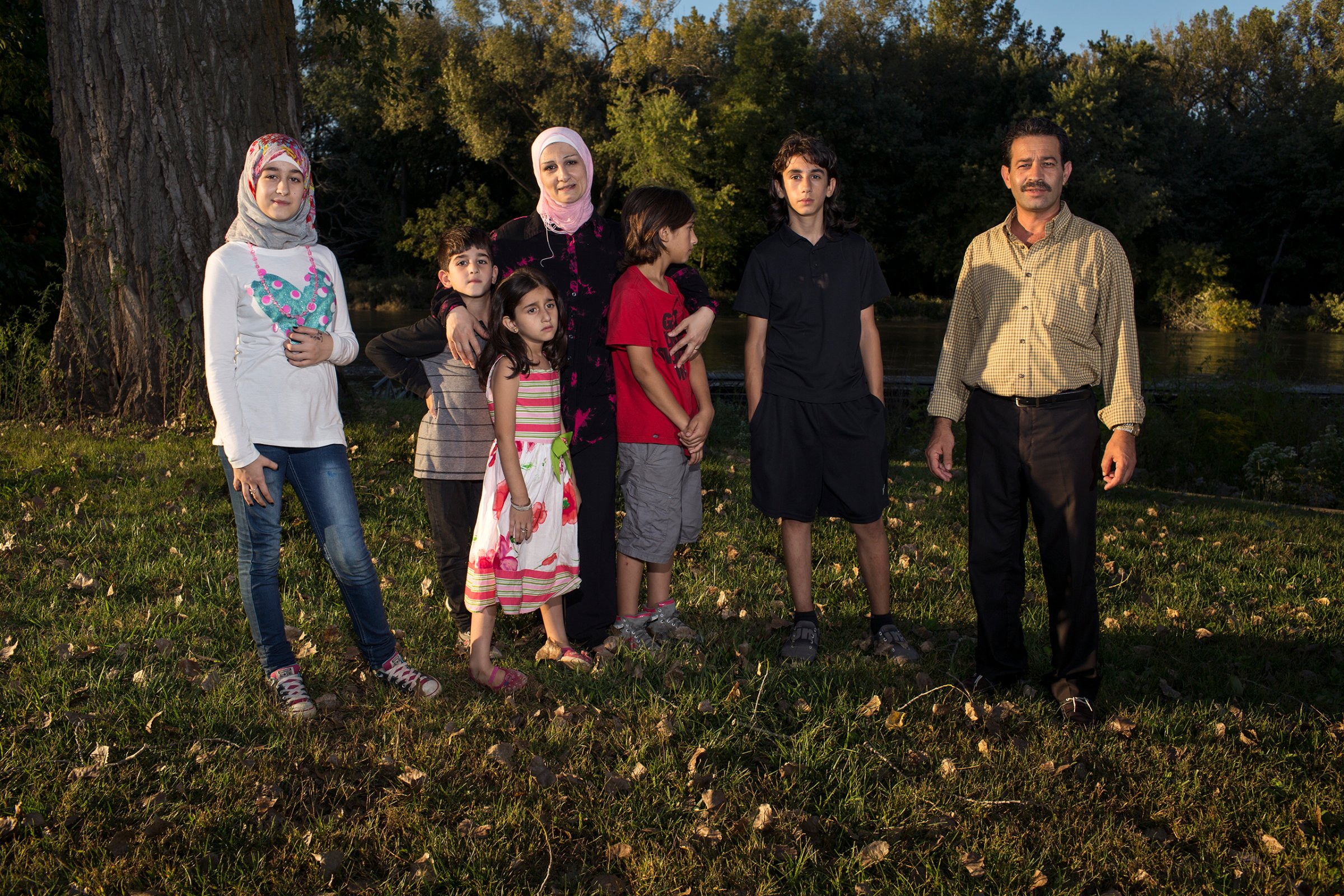 Ghazweh and Abdul Fattah at a park in Des Moines in 2016 with their children, from left to right: Sedra, Mutaz, Hala, Haidar and Nazeer. That year, the Tameems became the first Syrian refugee family to be resettled in Iowa. In the four decades of the U.S. refugee resettlement program, America has safely resettled more than three million of the world’s most vulnerable refugees with an average annual cap set at 95,000 prior to the Trump administration.