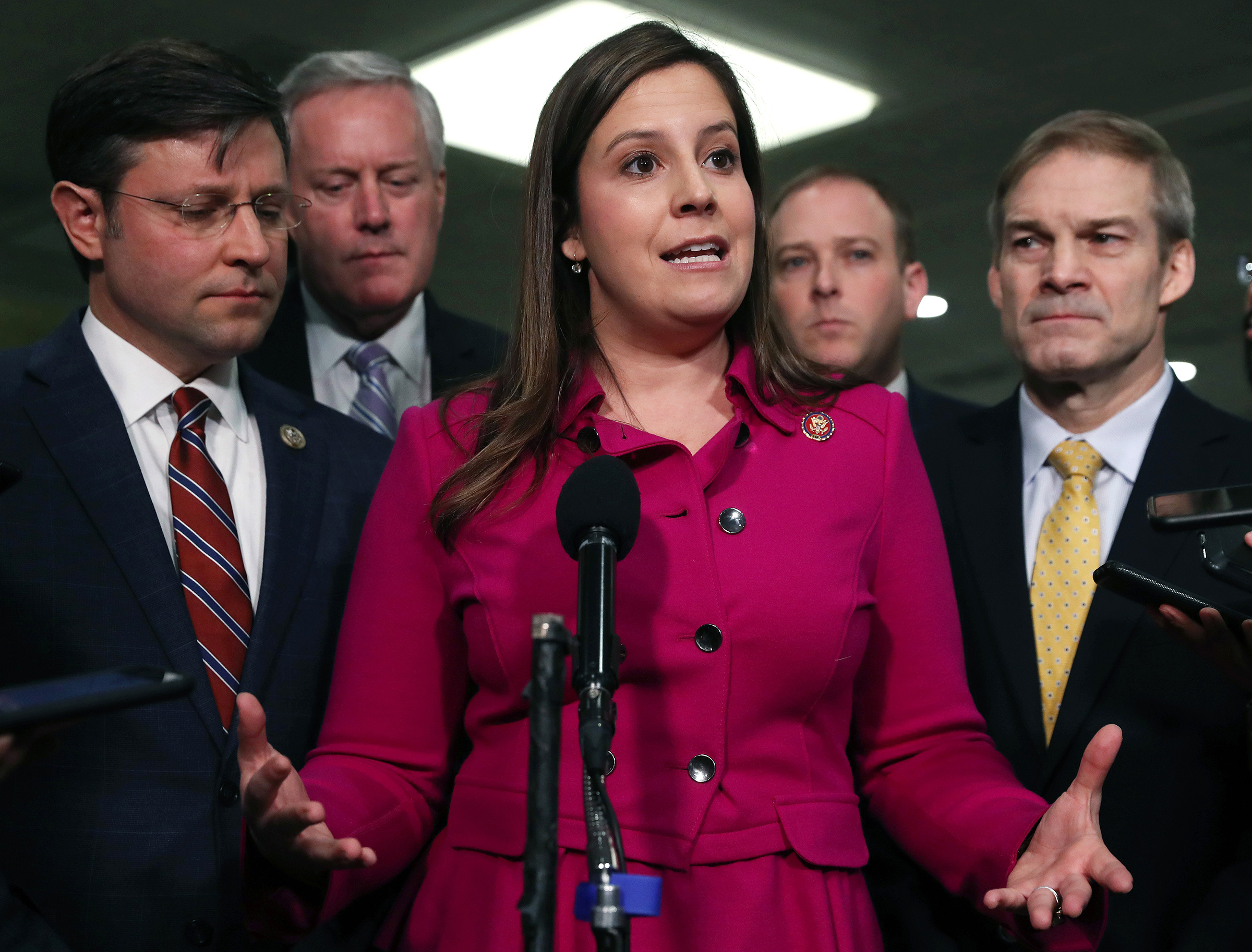 Rep. Elise Stefanik speaks with reporters in the Senate subway before the impeachment trial of former President Donald Trump resumes at the U.S. Capitol on Jan. 23, 2020. Surrounding Stefanik, from left to right: Rep. Mike Johnson (R-LA), Rep. Mark Meadows (R-NC), Rep. Lee Zeldin (R-NY), and Rep. Jim Jordan (R-OH). (Mark Wilson—Getty Images)