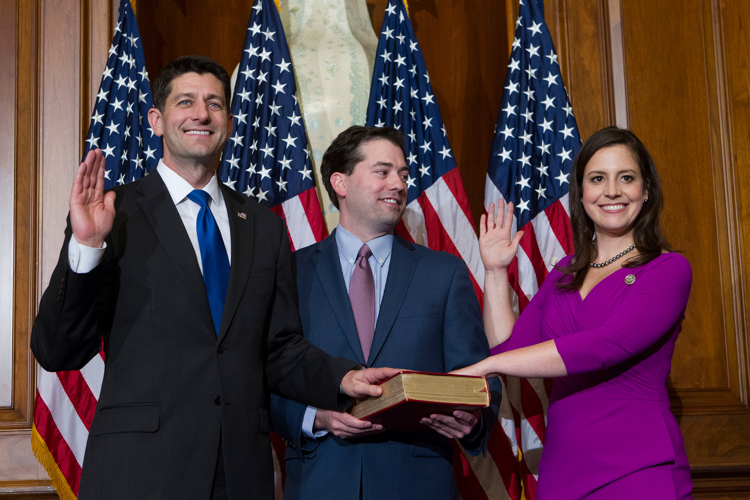 Former House Speaker Paul Ryan administers the House oath of office to Elise Stefanik during a mock swearing in ceremony on Capitol Hill in Washington, Jan. 3, 2017, as the 115th Congress began.