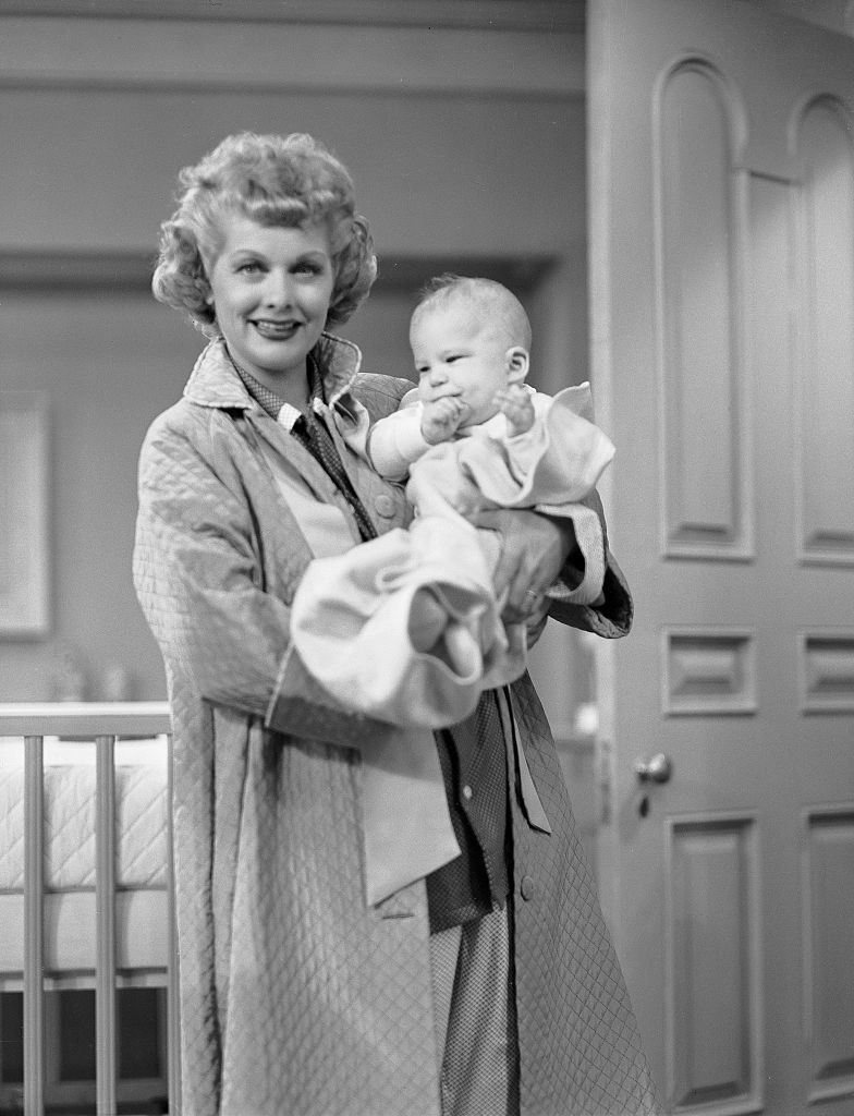 Lucille Ball as Lucy Ricardo, holding Richard Lee Simmons as Little Ricky Jr.  Image dated March 1, 1953. (CBS via Getty Images)