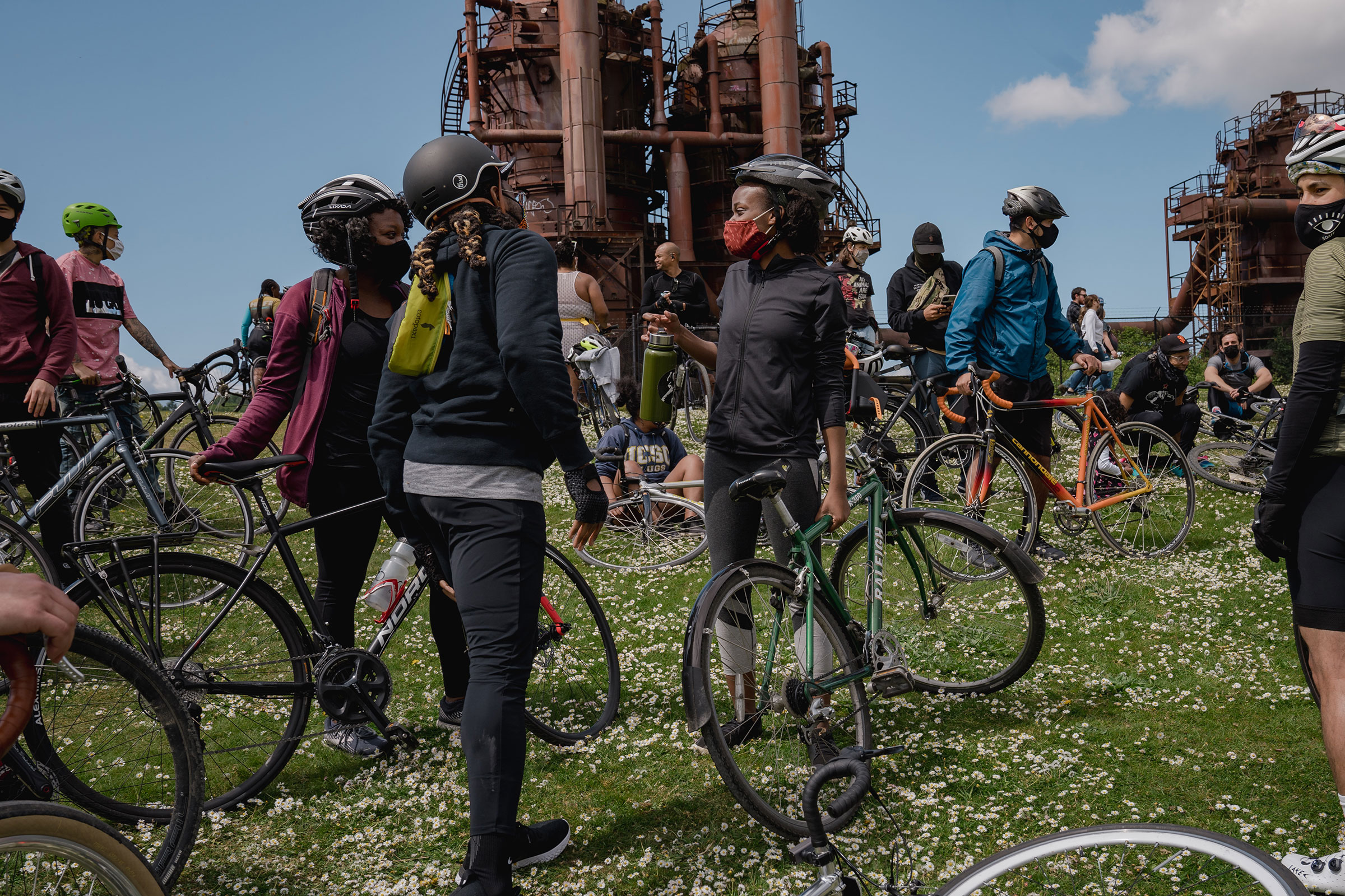 Members of the NorthStar Cycling Club at Gas Works Park in Seattle, during the club’s weekly “Sunday Service” ride, on May 2, 2021. (Jovelle Tamayo for TIME)
