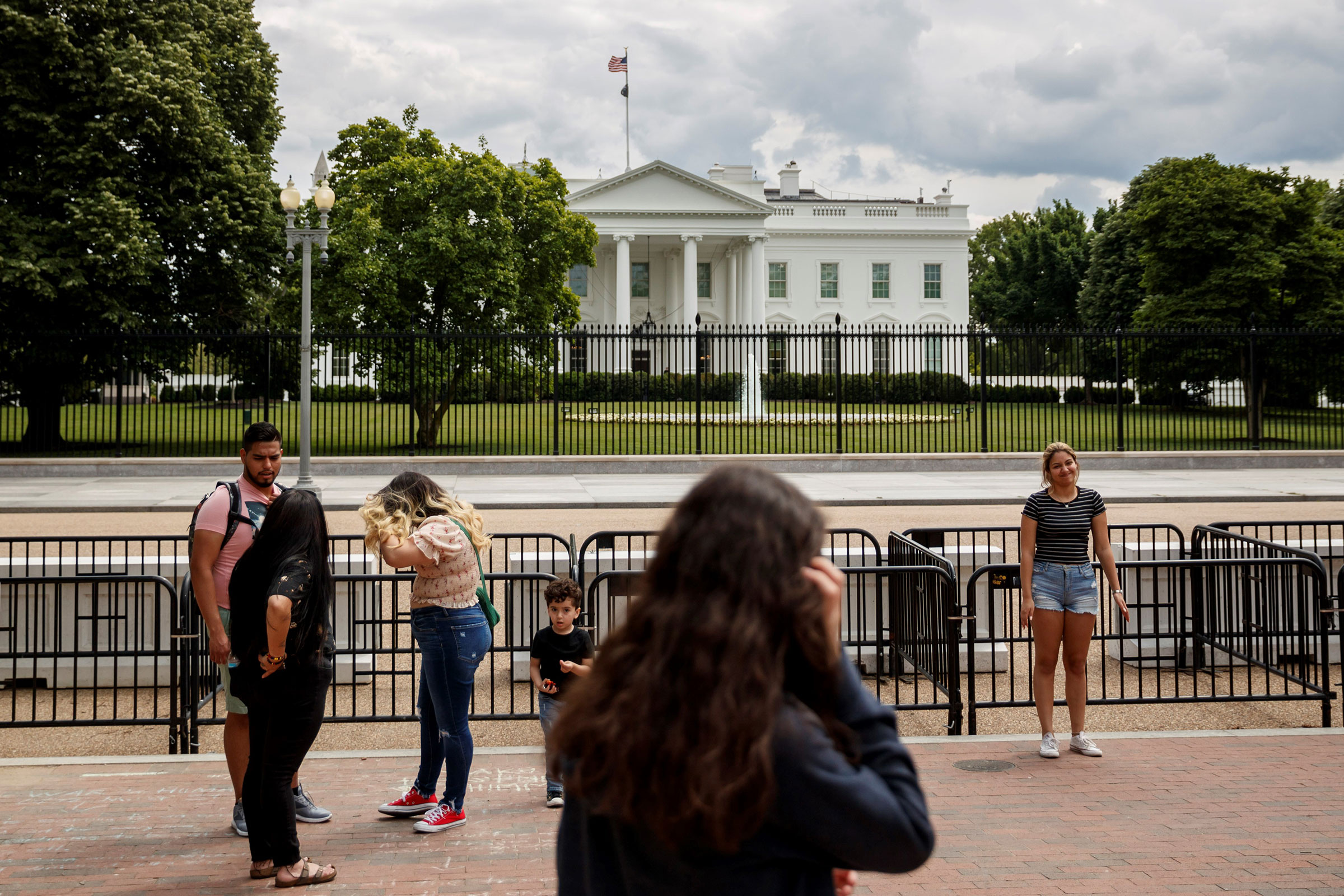 People are seen near the White House in Washington, on May 17, 2021. (Ting Shen—Xinhua/Getty Images)