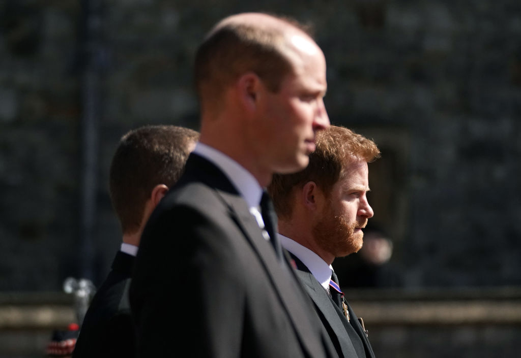 Prince William, Duke of Cambridge and Prince Harry arrive for the funeral of Prince Philip, Duke of Edinburgh at St George's Chapel at Windsor Castle on April 17, 2021 in Windsor, England. (Victoria Jones—WPA Pool/Getty Images)