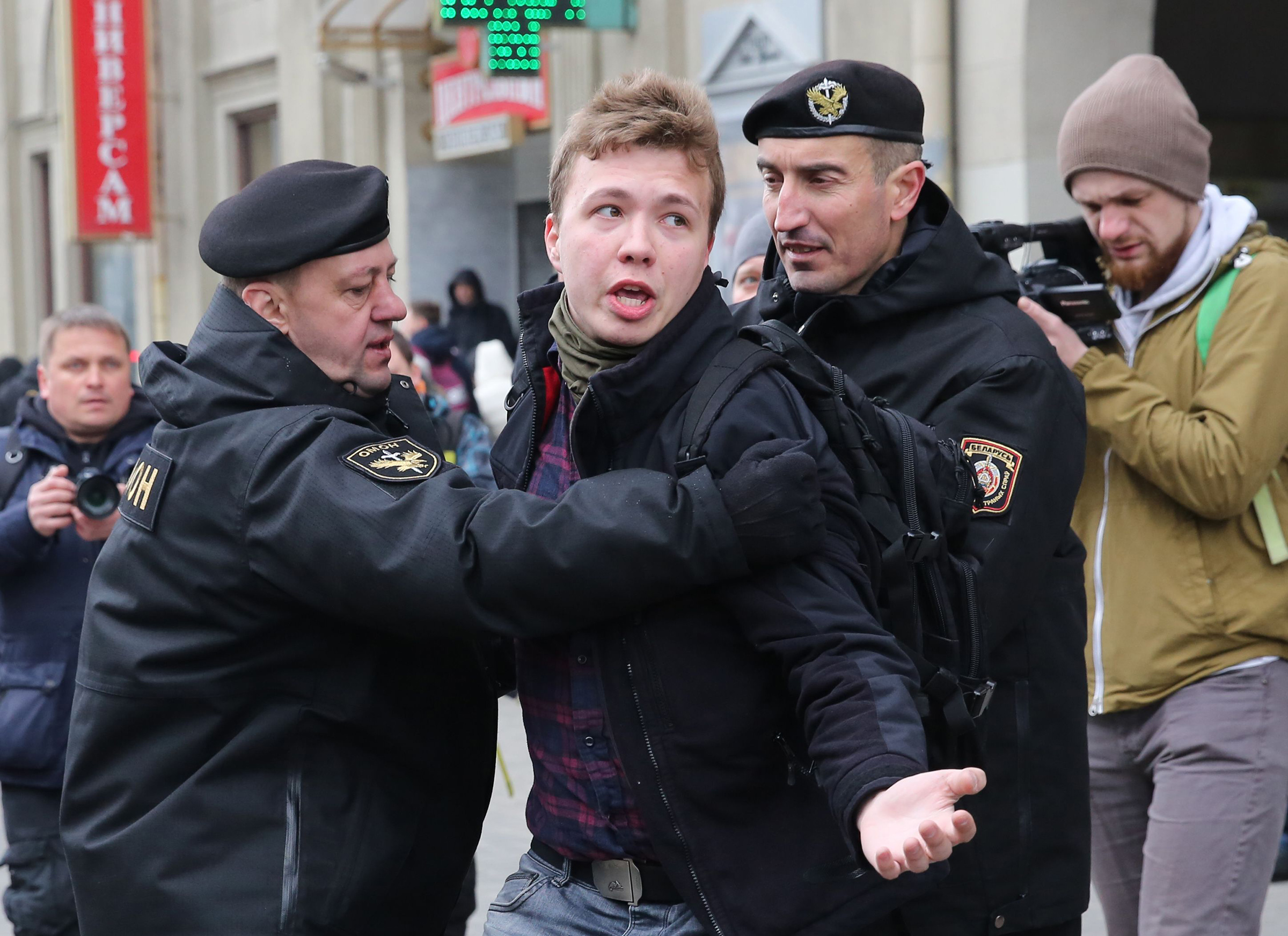 In March 2017, police officers detain journalist Roman Protasevich while attempting to cover a rally in Minsk.
