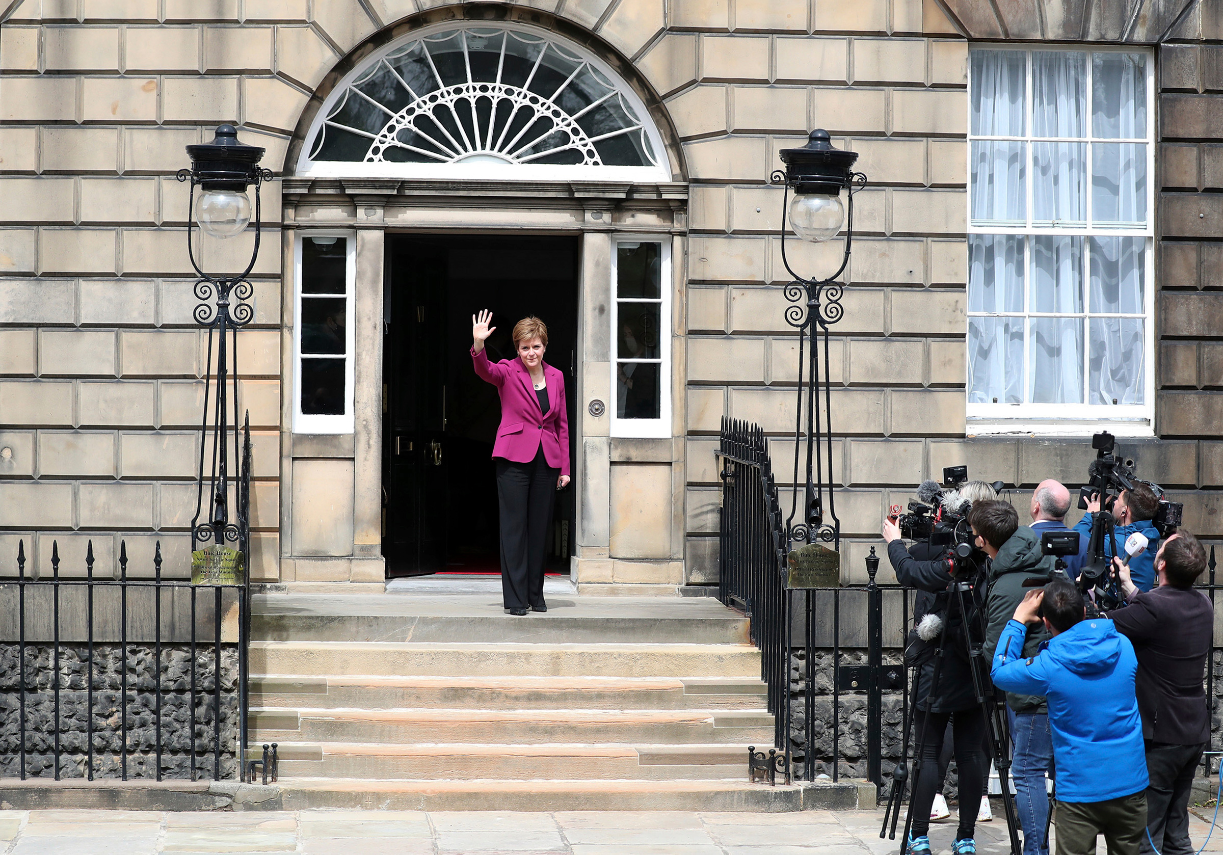 Scotland's First Minister and Scottish National Party leader Nicola Sturgeon poses for photographers at Bute House in Edinburgh on May 9. Sturgeon said the election results proved a second independence vote for Scotland was “the will of the country." (Scott Heppell—AP)