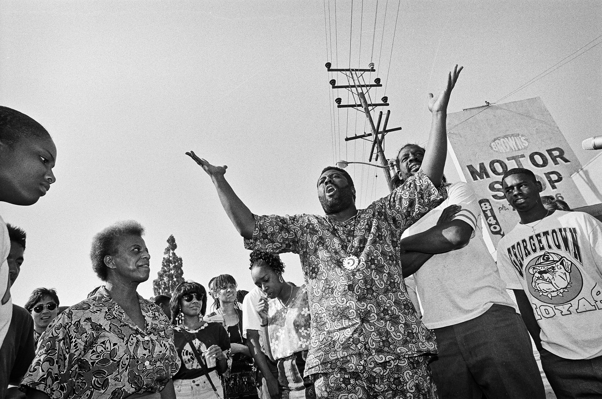 After days of rioting, South Central residents gather to ask their fellow residents to stop the violence. (Ted Soqui—Corbis/Getty Images)