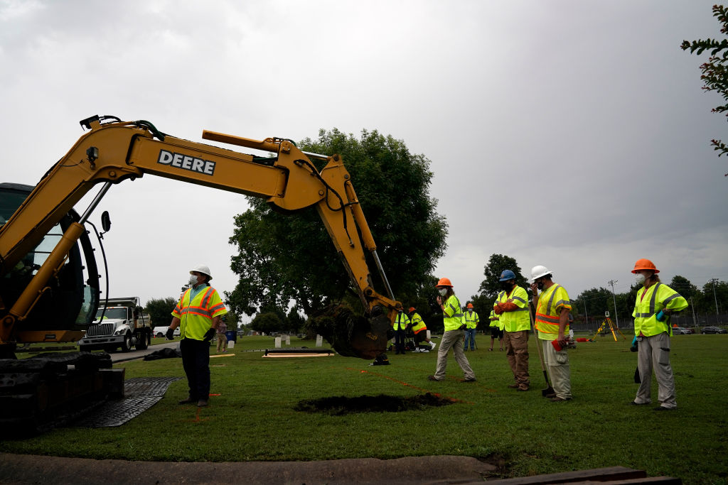 Archaeologists and observers watch during a test excavation of the potential 1921 Tulsa Race Massacre Graves at Oaklawn Cemetery in Tulsa, Okla., on July 13, 2020. (Nick Oxford—The Washington Post/Getty Images)