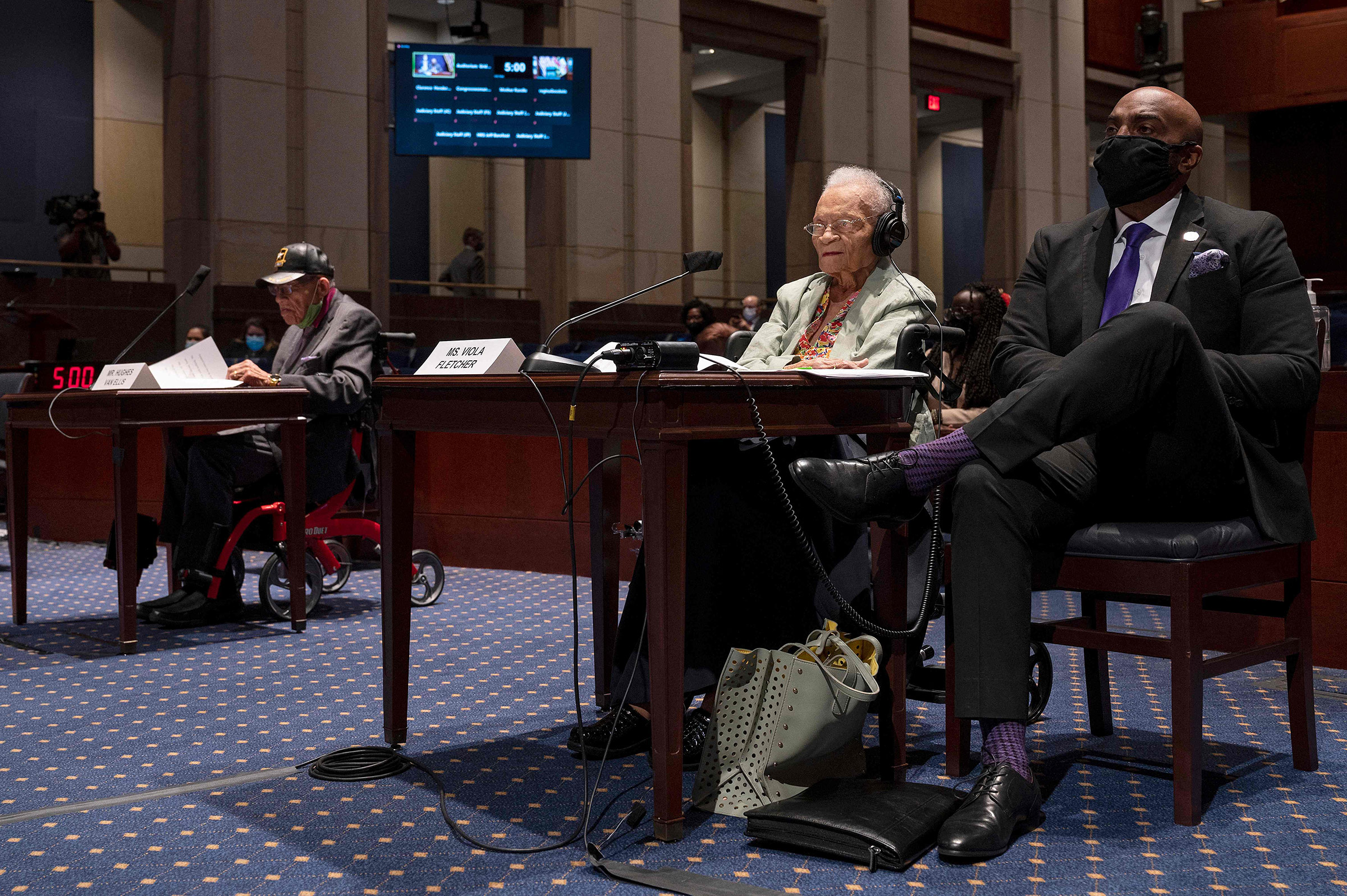 Hughes Van Ellis (left), a Tulsa Race Massacre survivor, and Viola Fletcher, the oldest living survivor, testify before the Civil Rights and Civil Liberties Subcommittee hearing on "Continuing Injustice: The Centennial of the Tulsa-Greenwood Race Massacre" on Capitol Hill in Washington, D.C., on May 19, 2021. (Jim Watson—AFP/Getty Images)