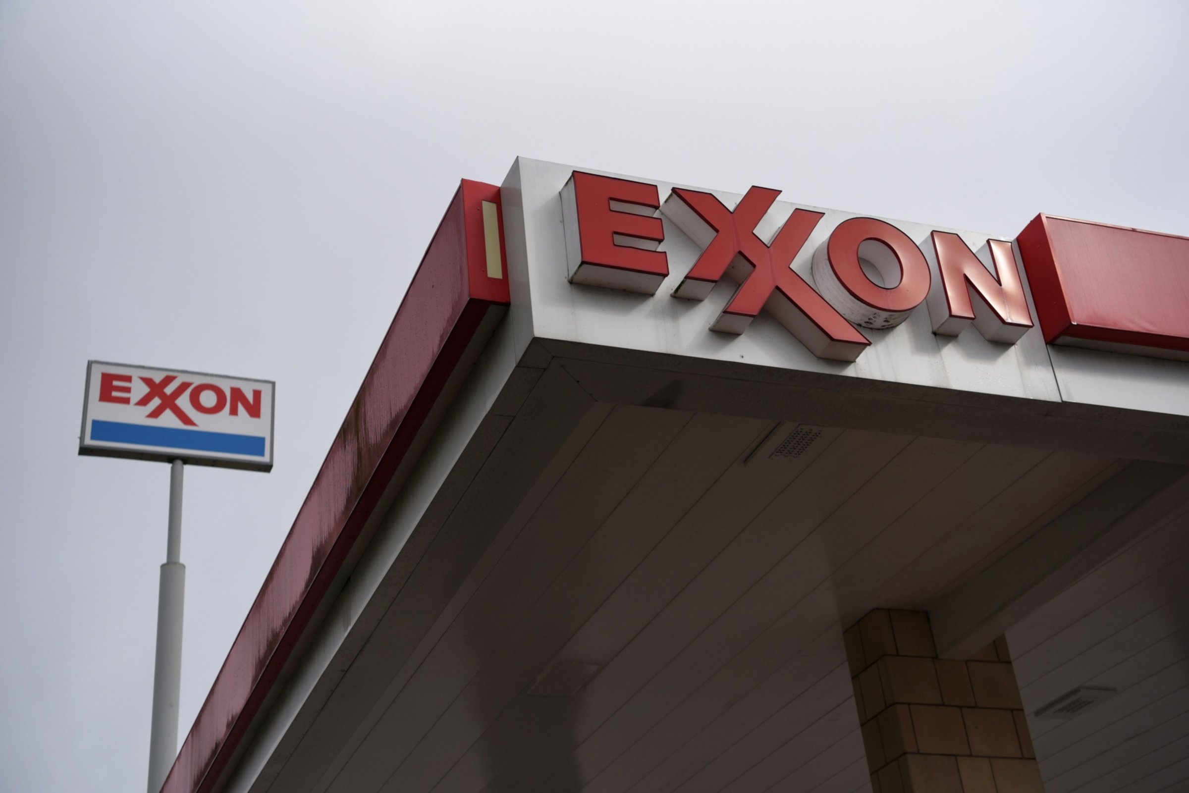 Signage at an Exxon Mobil Corp. gas station in Houston, Texas, U.S., on Wednesday, Oct. 28, 2020. Exxon is scheduled to release earnings figures on October 30.