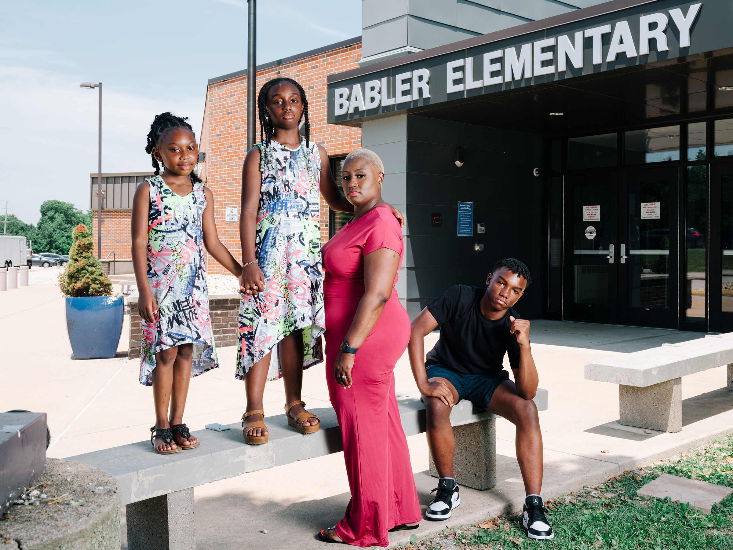 "If we can’t have these hard conversations, how can we possibly expect our children to?" Shemia Reese with her family at Babler Elementary in Glencoe, Mo., on June 18. (David Kasnic for TIME)