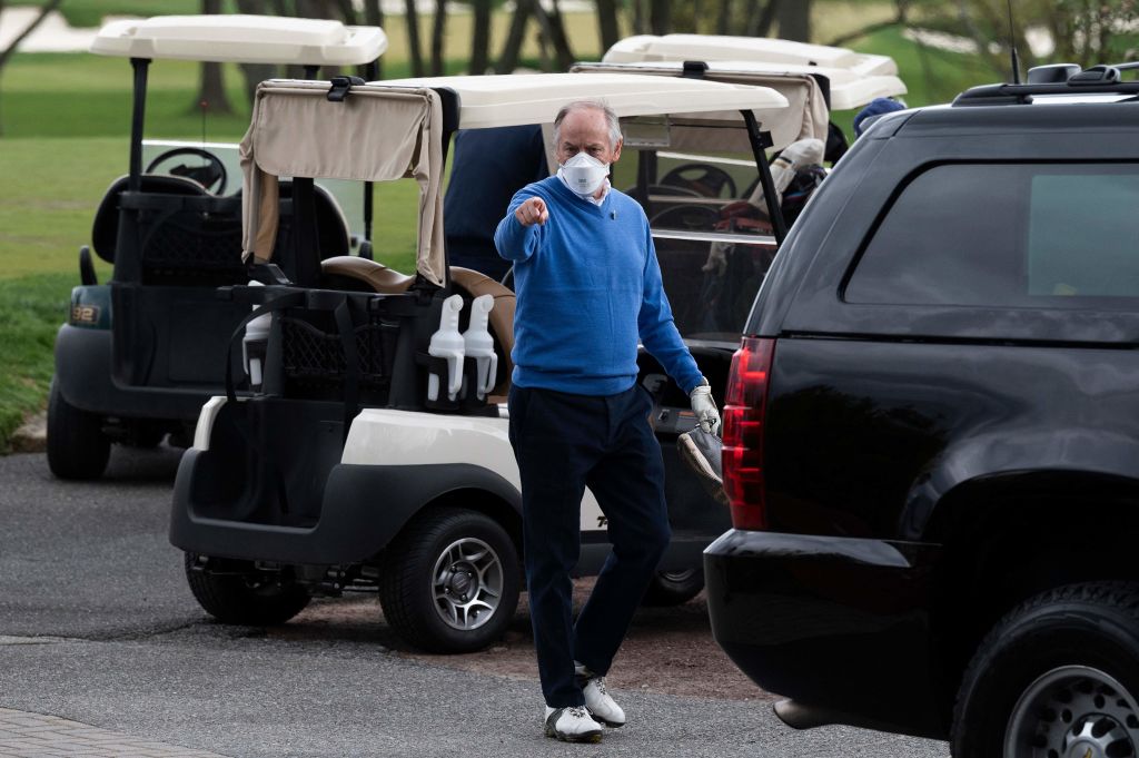 Counselor to the President Steve Ricchetti (C) after playing a round of golf with US President Joe Biden at Wilmington Country Club in Wilmington, Delaware on April 17, 2021. (Jim Watson—AFP/Getty Images)