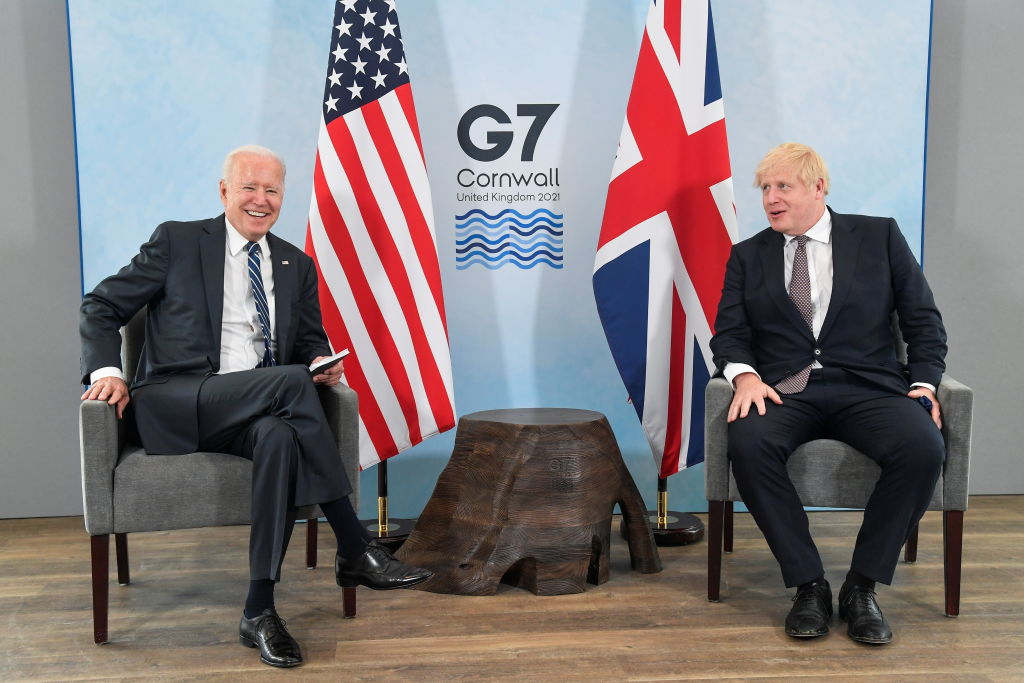 CARBIS BAY, ENGLAND - JUNE 10:  Britain's Prime Minister Boris Johnson speaks with U.S. President Joe Biden during their meeting, ahead of the G7 summit, at Carbis Bay Hotel, on June 10, 2021 near St Ives, England. UK Prime Minister, Boris Johnson, will host leaders from the USA, Japan, Germany, France, Italy and Canada at the G7 Summit that begins on Friday, June 11 2021. (Photo by Toby Melville - WPA Pool/Getty Images) (Getty Images&mdash;2021 Getty Images)