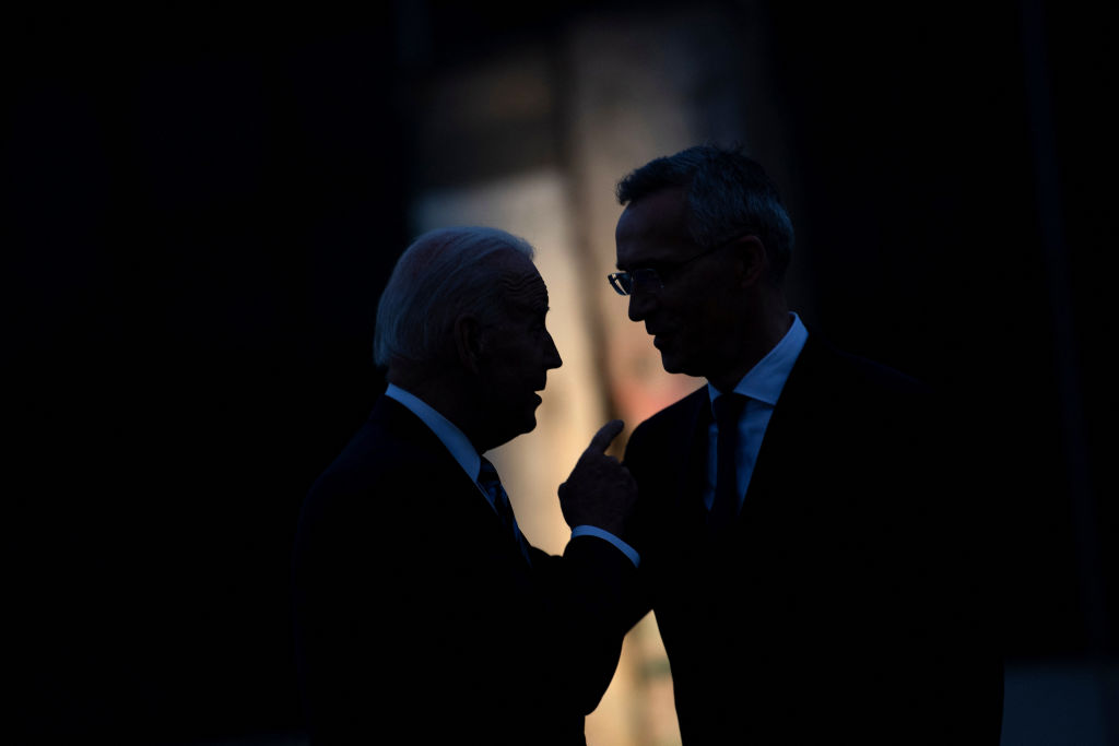 President Joe Biden and NATO Secretary General Jens Stoltenberg, right, talk after a summit at NATO Headquarters in Brussels on June 14, 2021. (Brendan Smialowski—AFP/Getty Images)