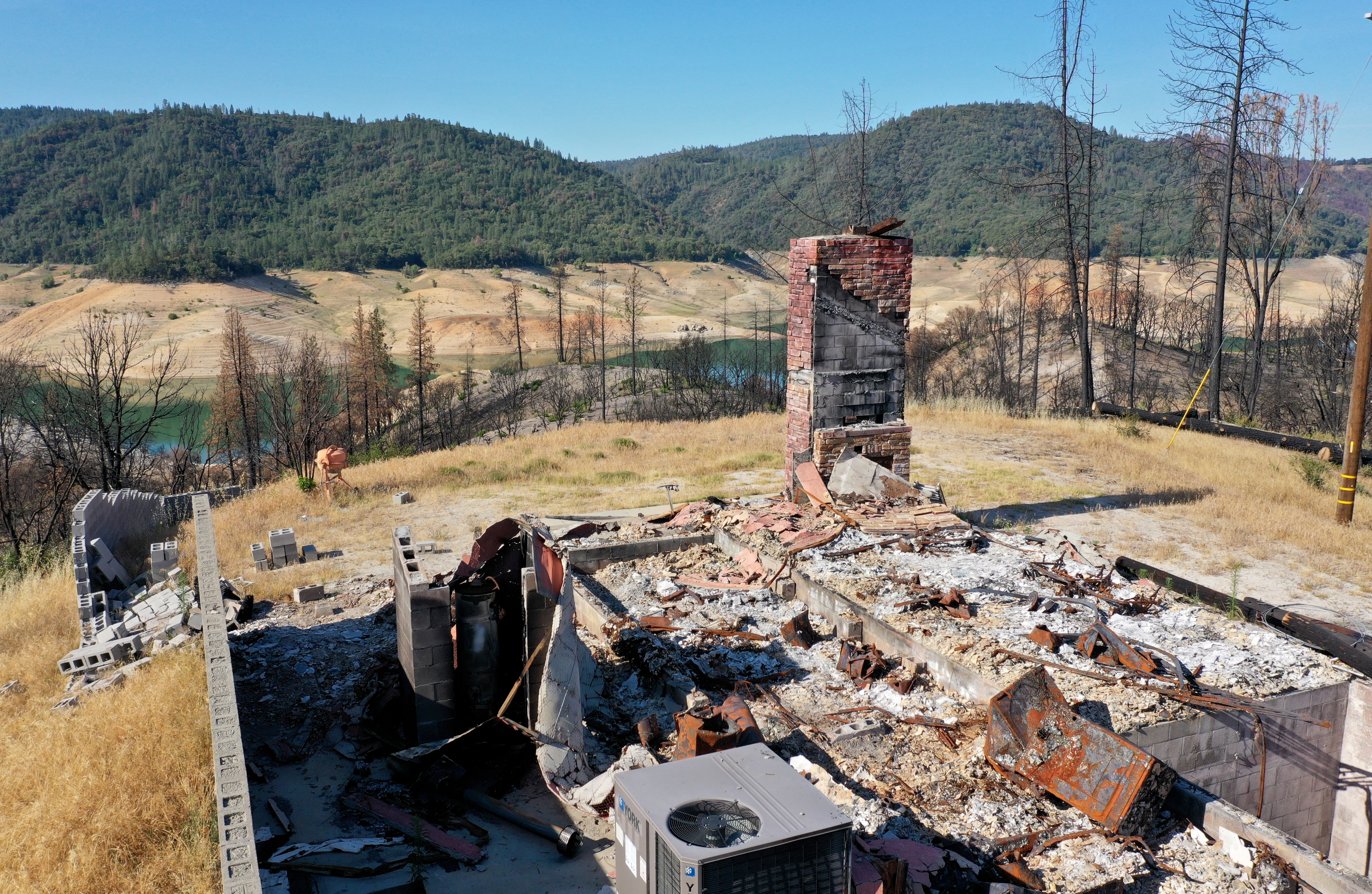 The ruins of a home hit by a recent wildfire in Oroville, Calif. (Justin Sullivan—Getty Images)