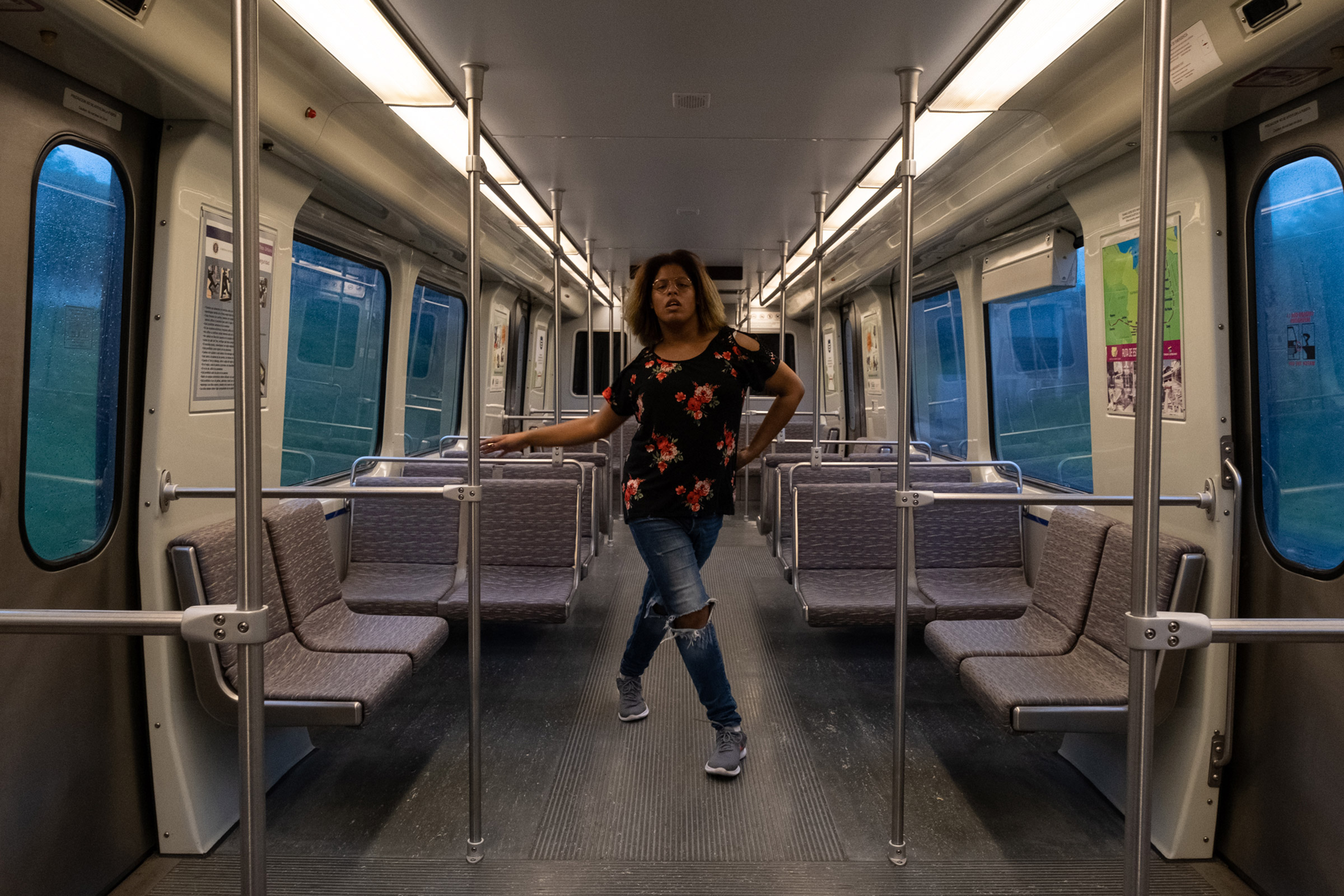 LeQueen, 21, vogues on the train she takes on a daily basis to commute to work and other places around San Juan, Puerto Rico. (Gabriella N. Báez—Magnum Foundation)