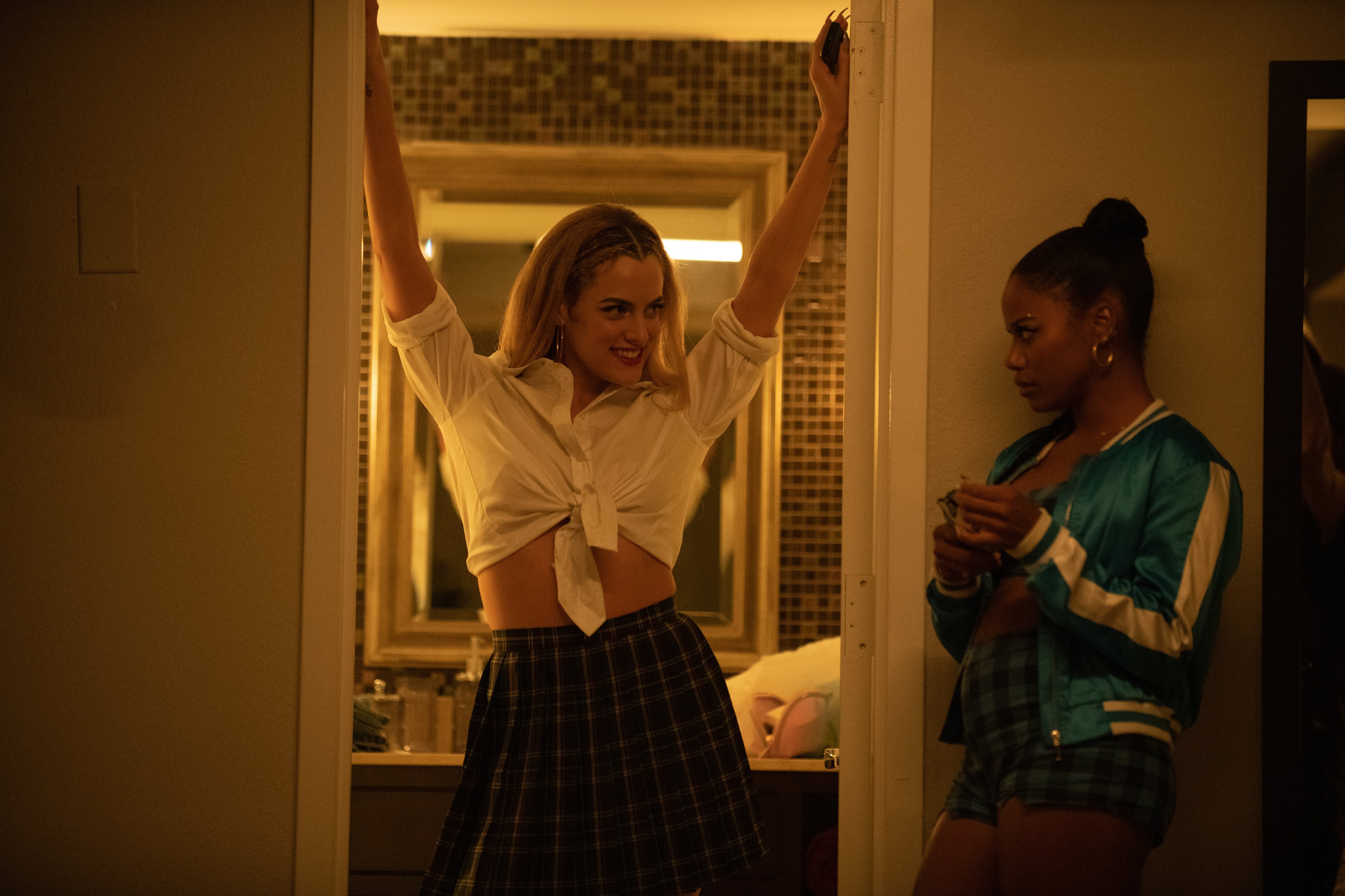 Riley Keough (left) and Taylour Paige (right) in 'Zola' (Courtesy of Anna Kooris / A24 Fi—©A24 Films)